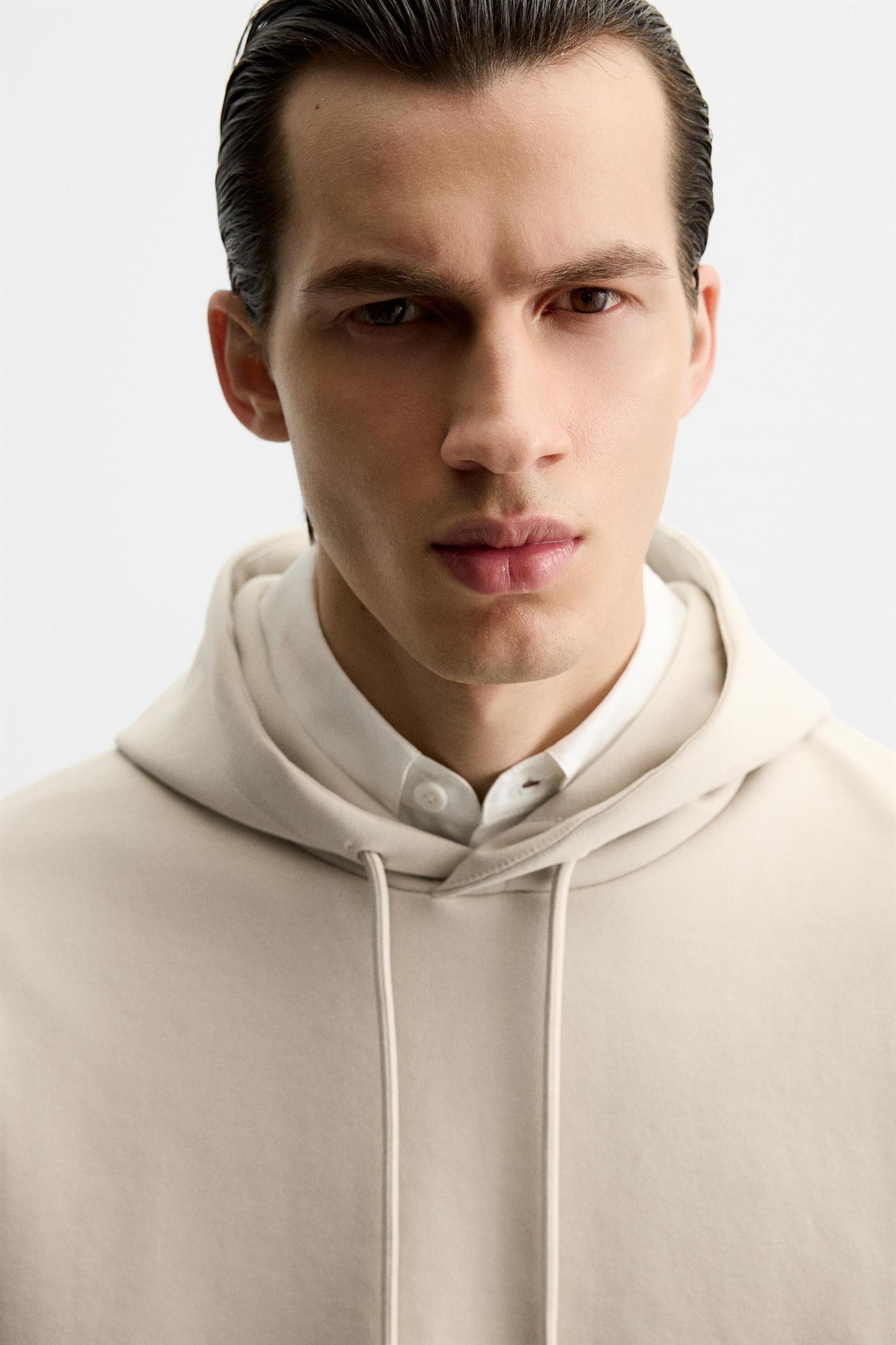 TECHNICAL HOODED SWEATSHIRT Product Image