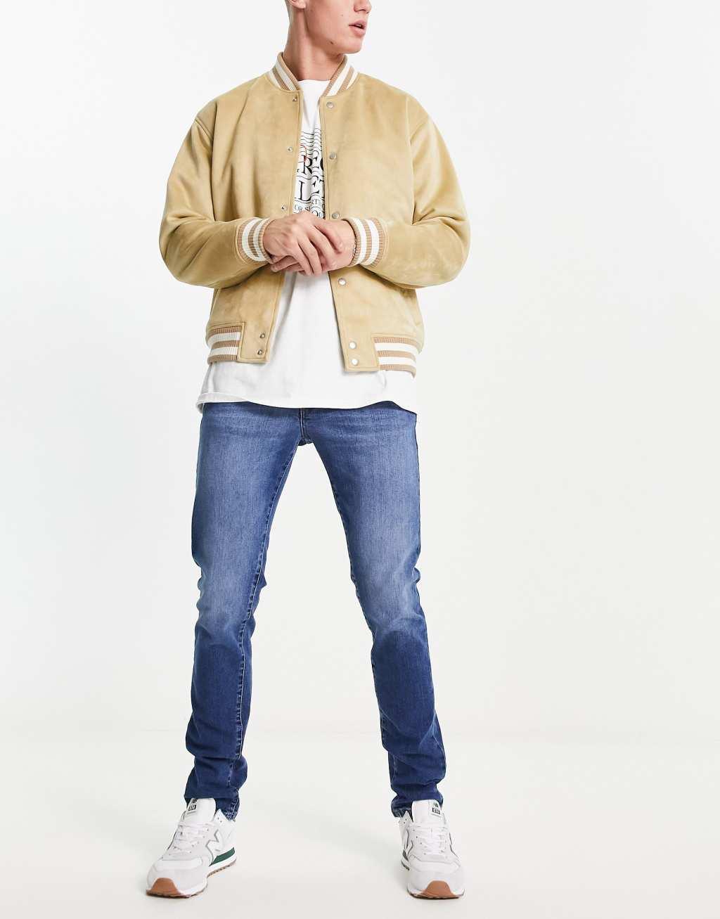 Scalpers slim jeans in medium blue Product Image