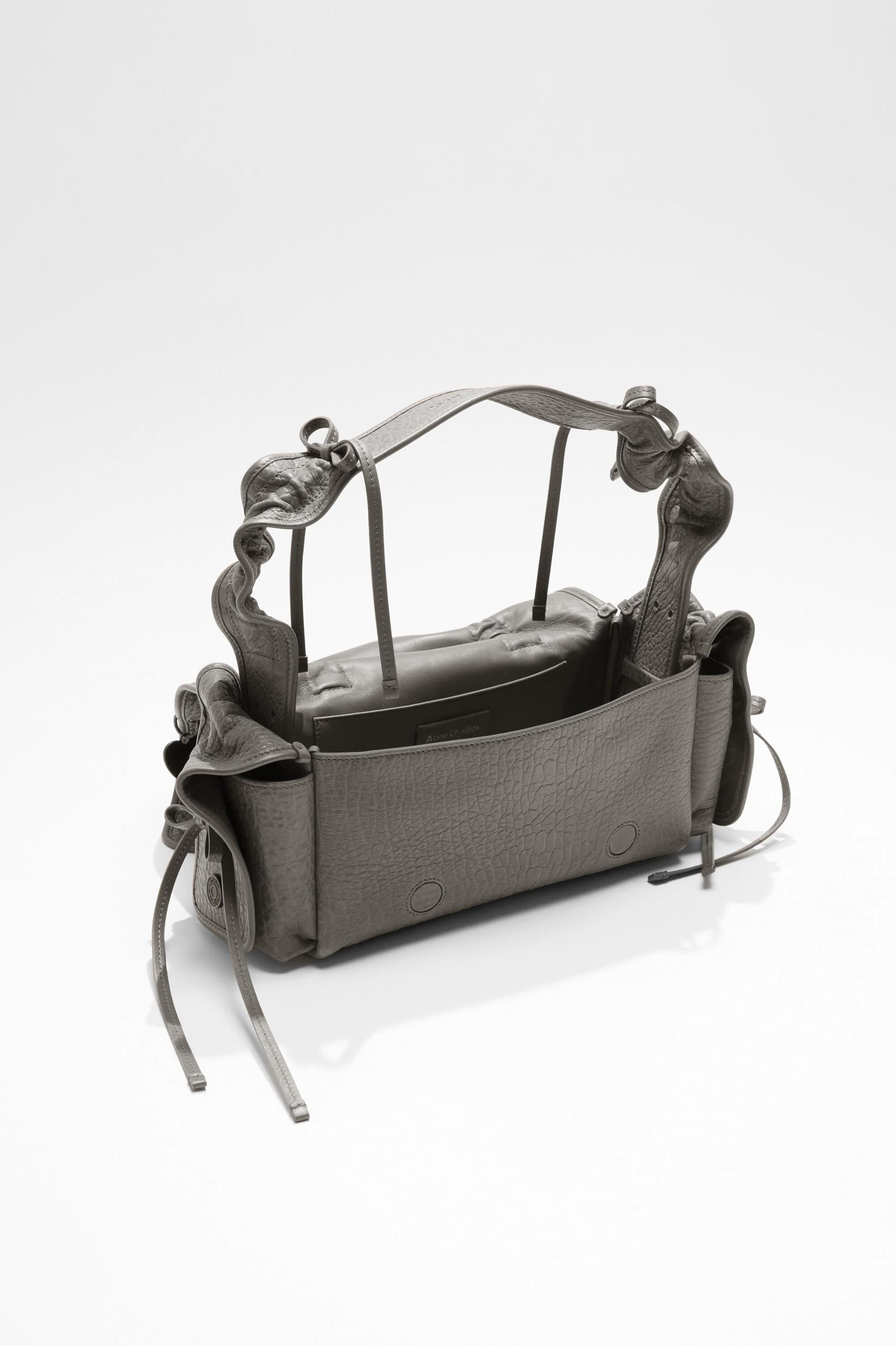 Multipocket grained leather bag Product Image