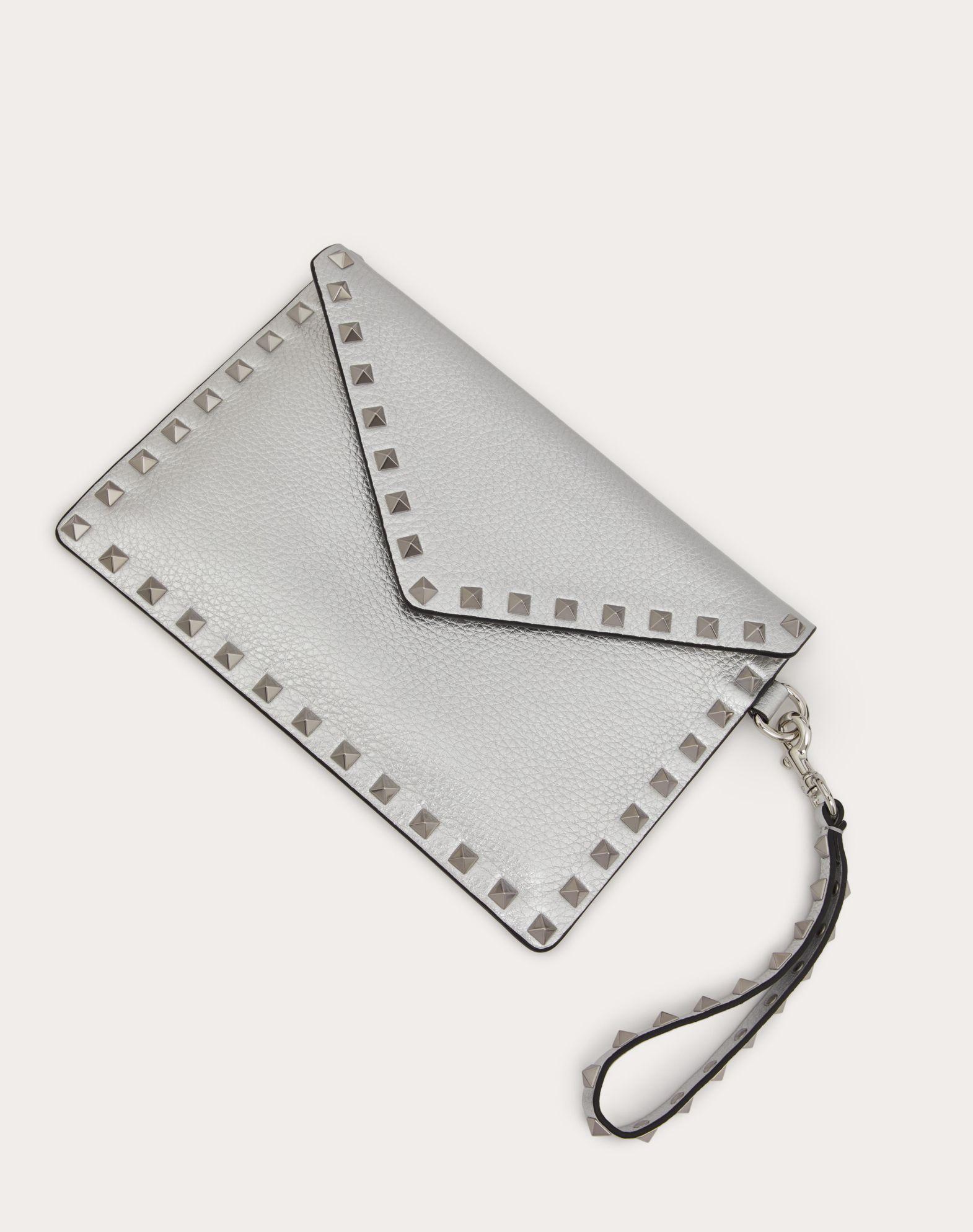 ROCKSTUD METALLIC GRAINY CALFSKIN CLUTCH BAG Product Image