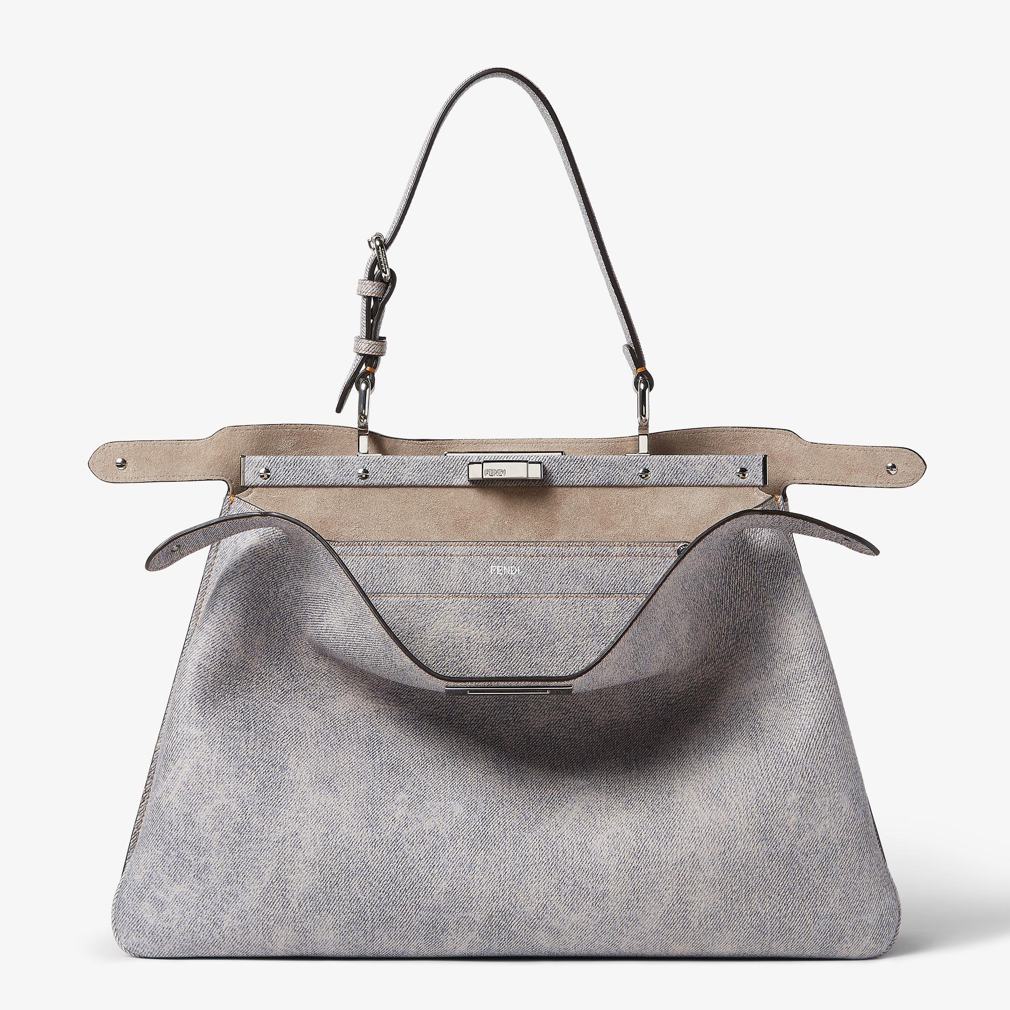 Peekaboo Soft LargeGray leather bag with a faded denim effect. Product Image