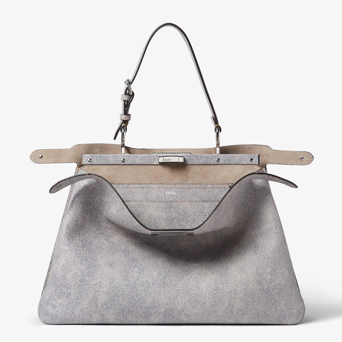 Peekaboo Soft LargeGray leather bag with a faded denim effect. Product Image