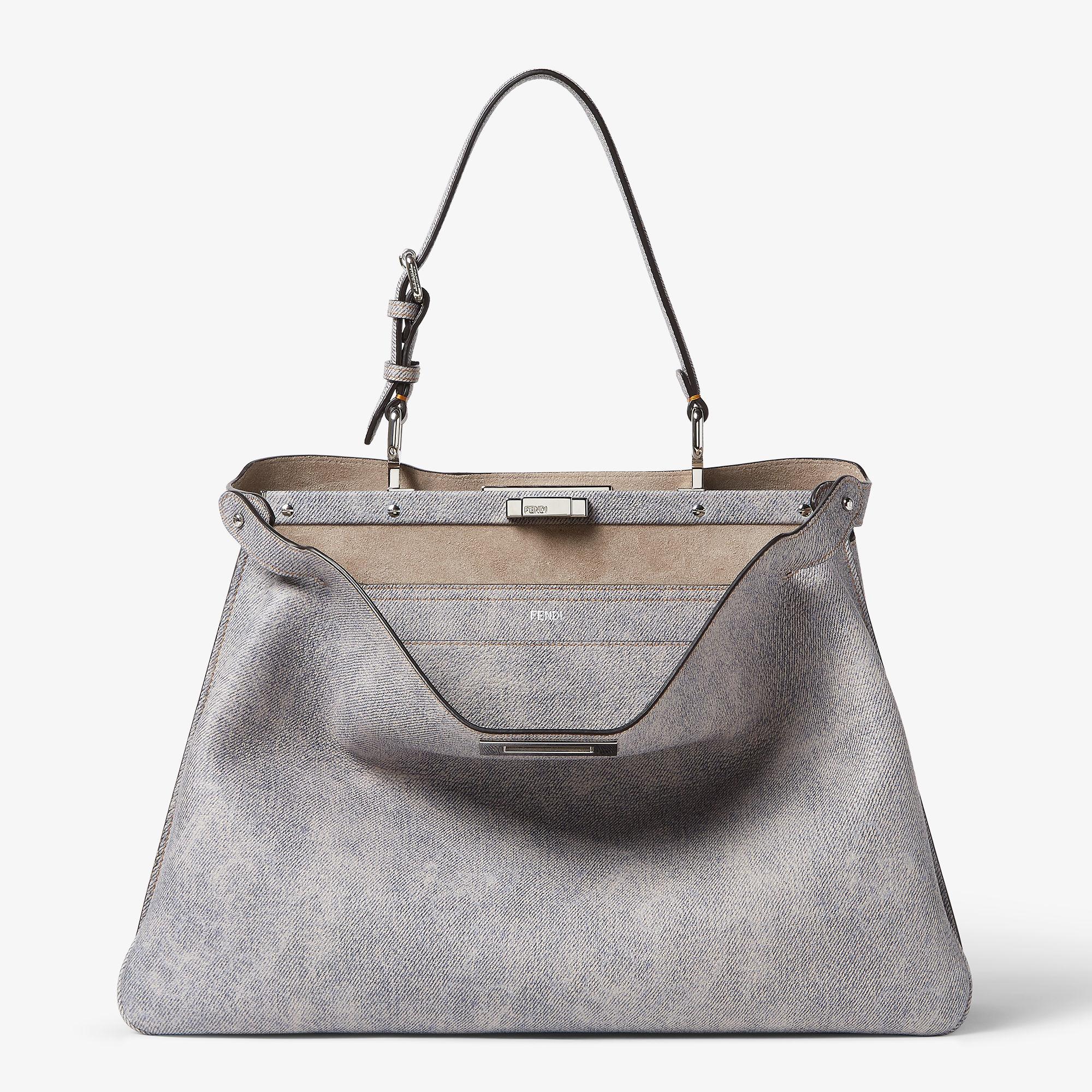 Peekaboo Soft LargeGray leather bag with a faded denim effect. Product Image