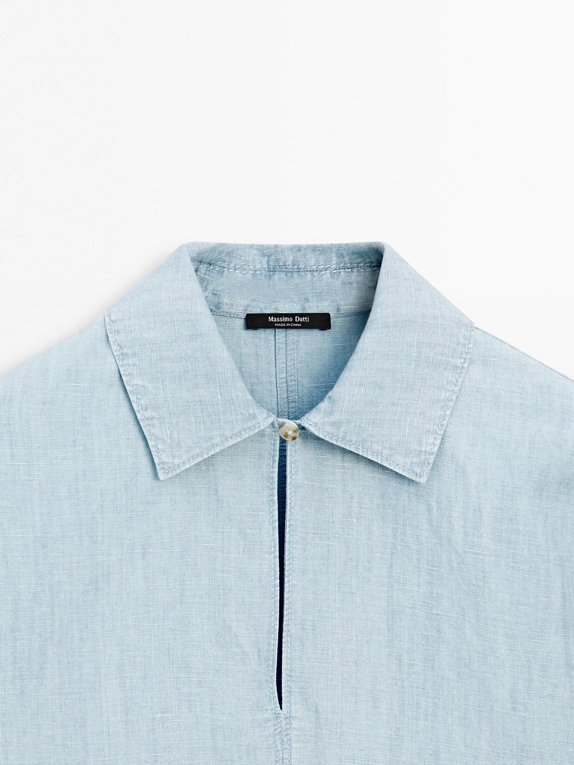 Oversize denim blouse with puff sleeves Product Image