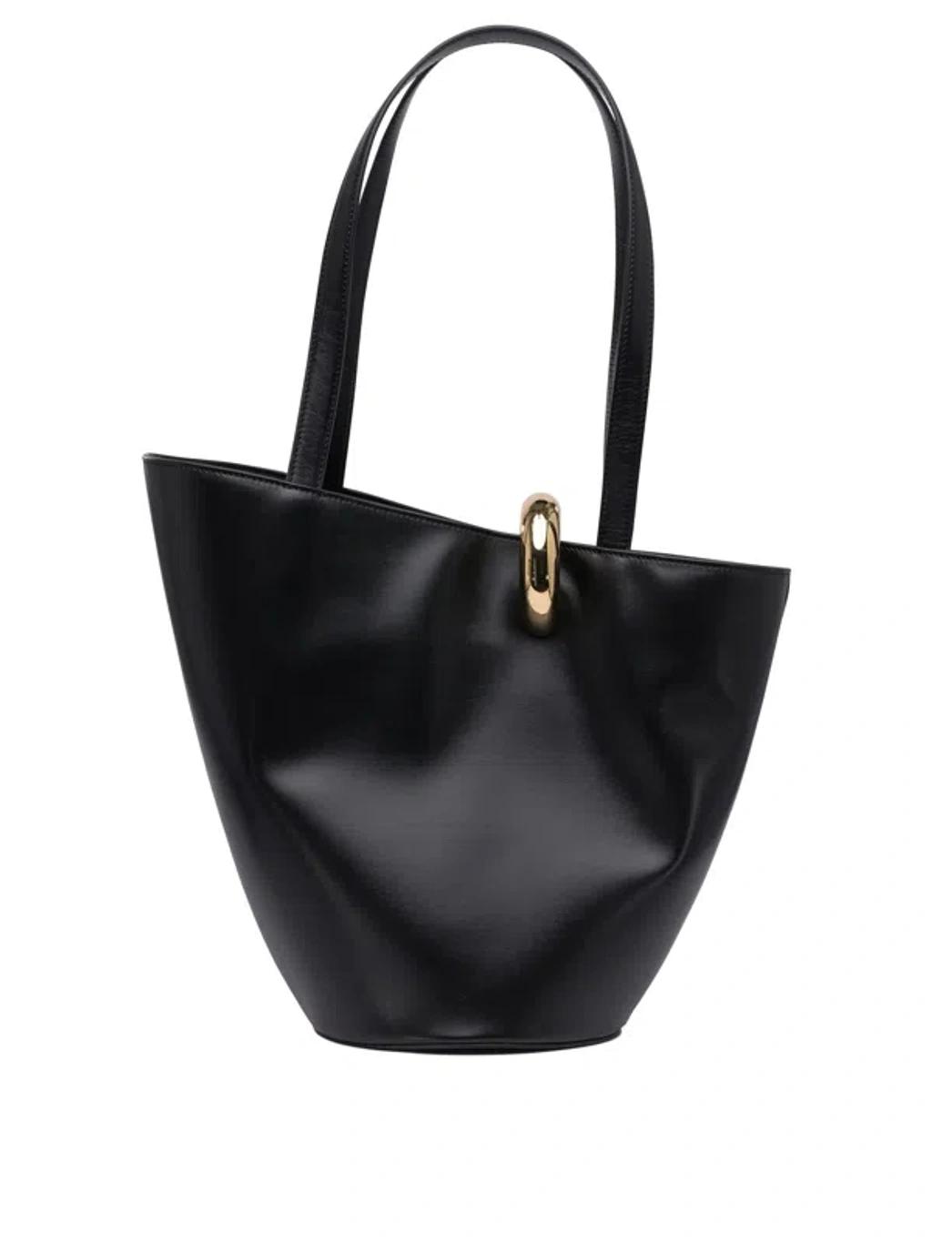 JACQUEMUS The Medium Bambola Asymmetric Leather Bucket Bag In Black 990 Product Image