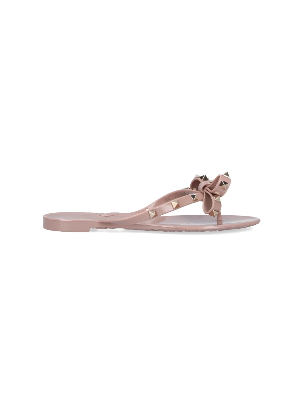 VALENTINO GARAVANI Women Rockstud Rubber Flip Flops In Beige Product Image