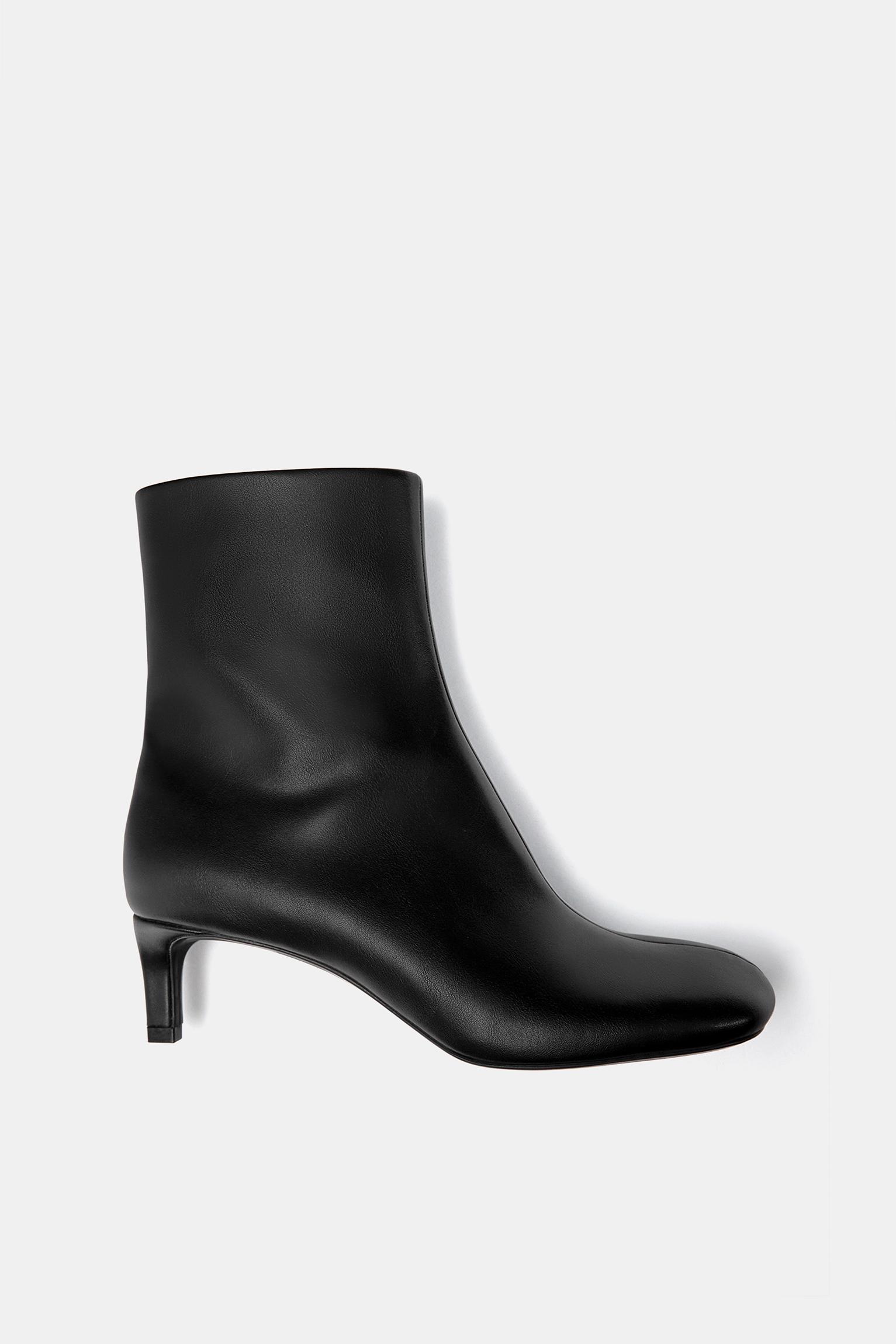 High-heel ankle boots with round toe Product Image