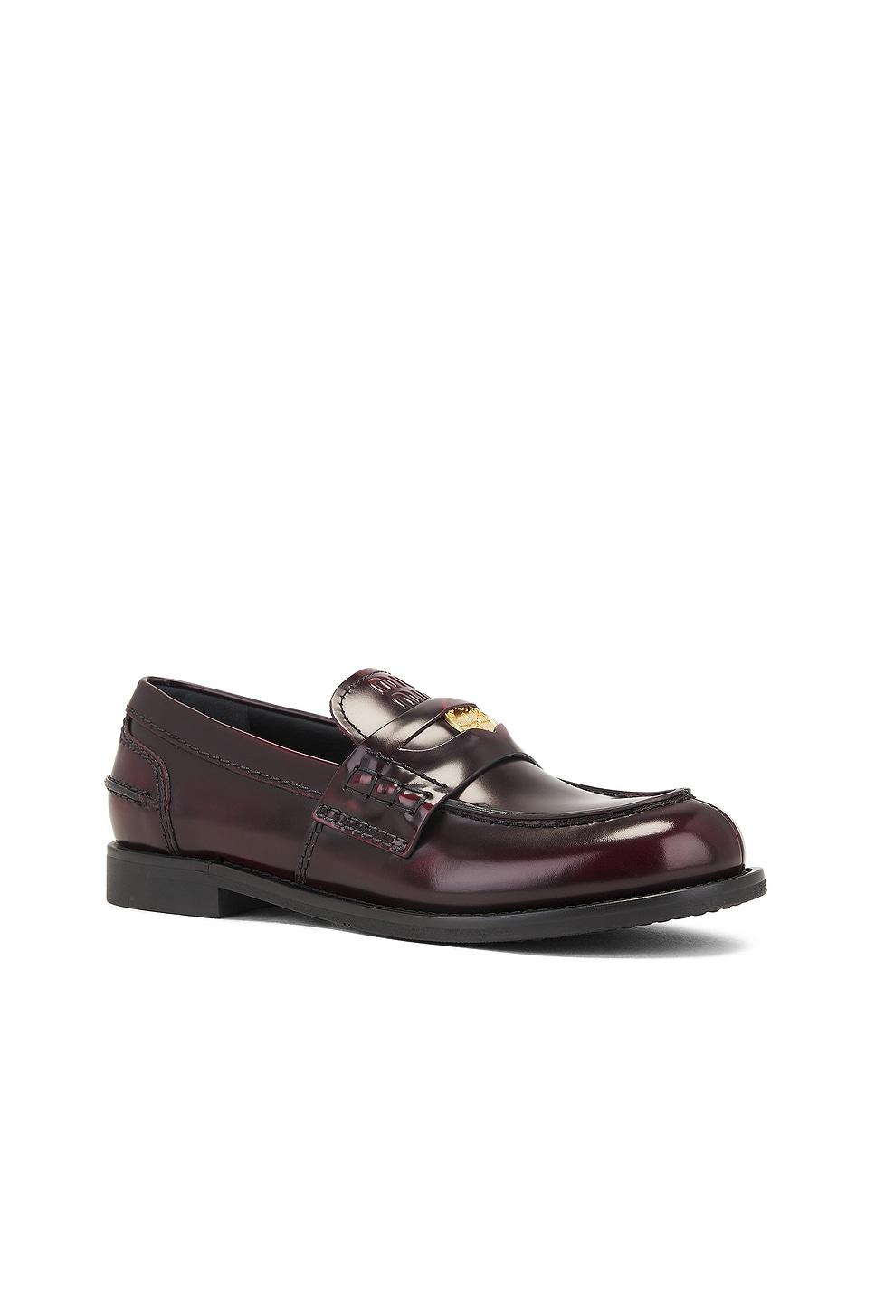 MIU MIU Leather Distressed Penny Loafers In Brown Product Image