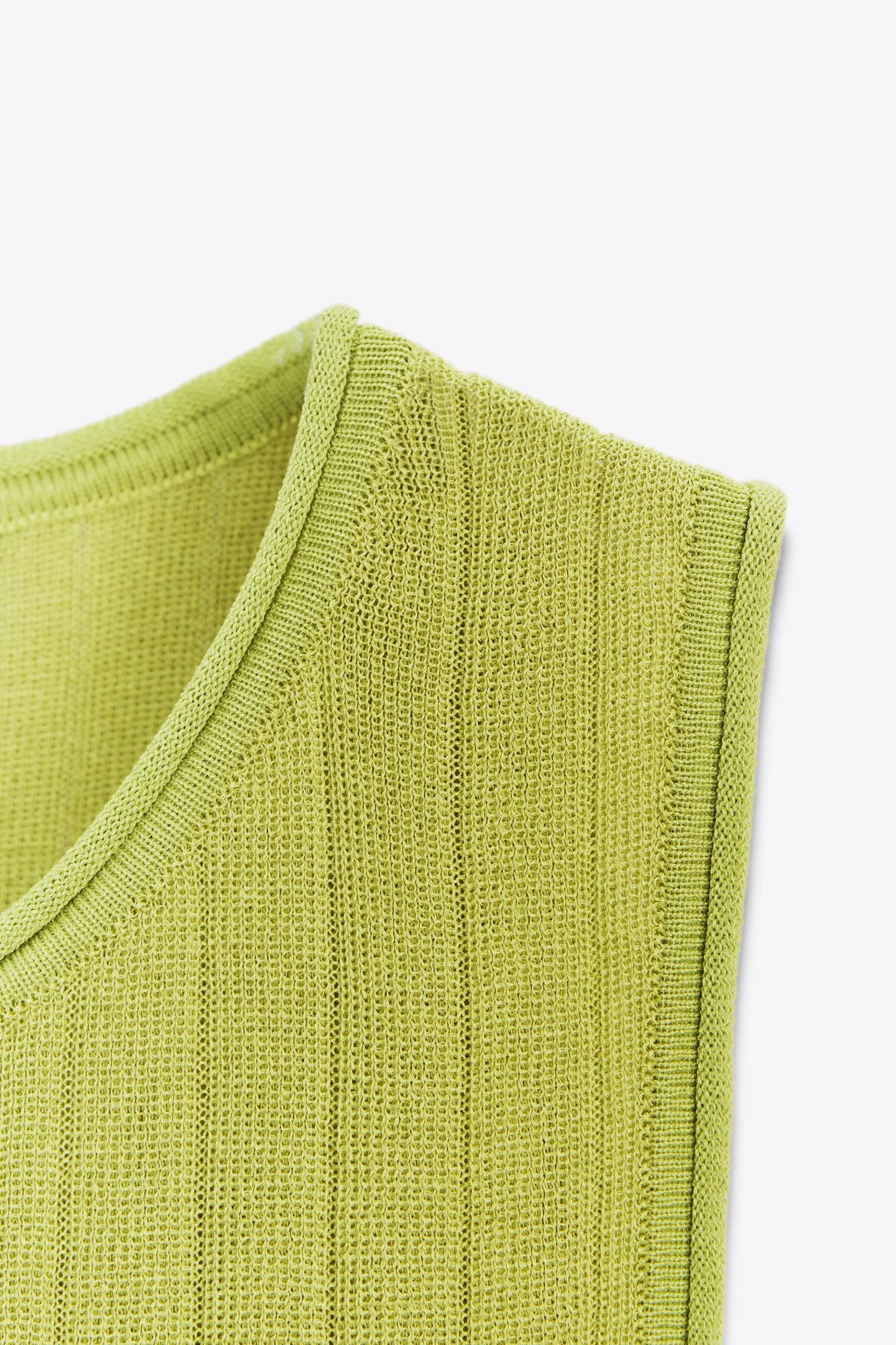 RUFFLED HEM KNIT TOP Product Image