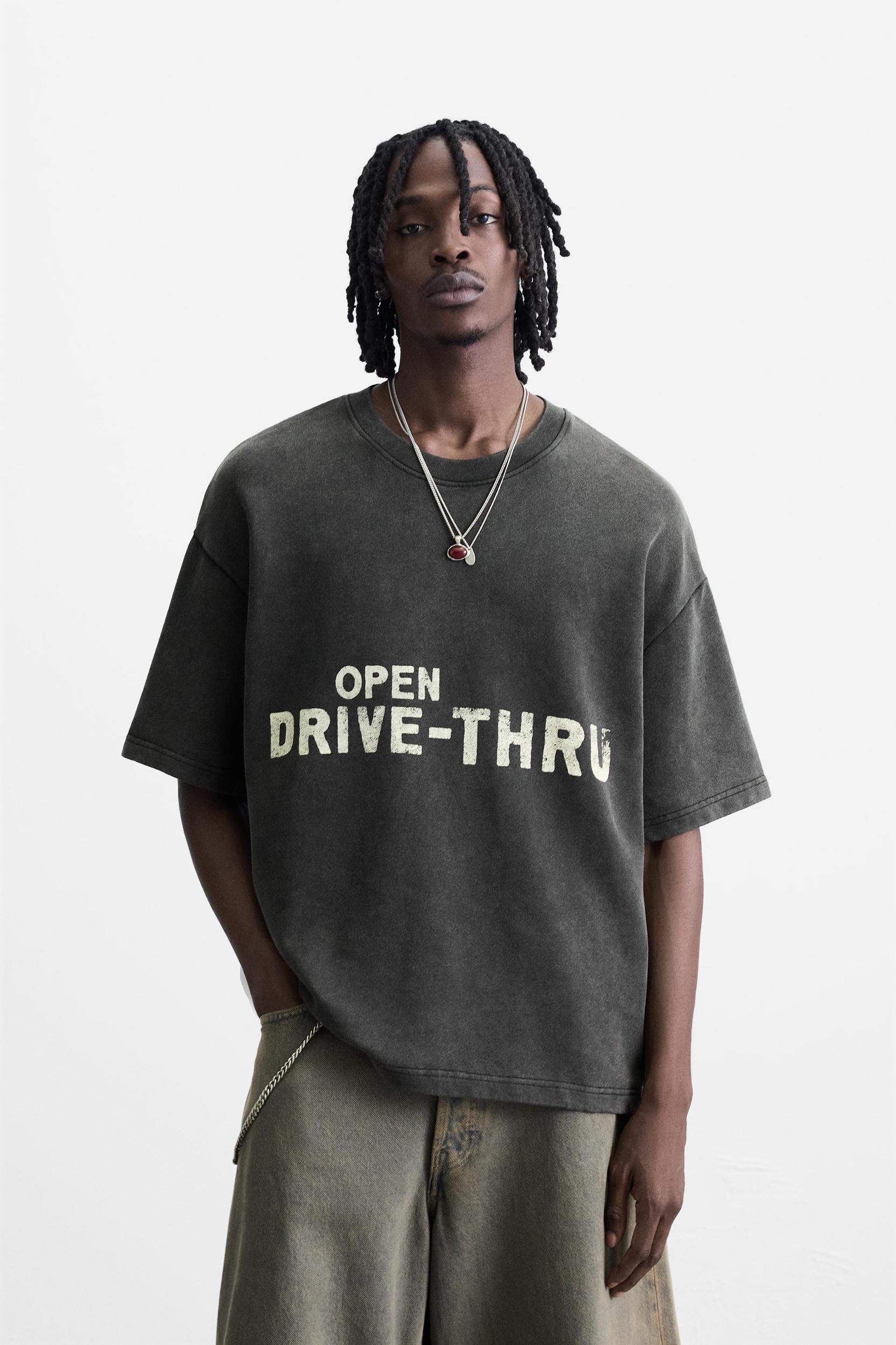 WASHED SWEATSHIRT WITH GRAPHIC PRINTS Product Image