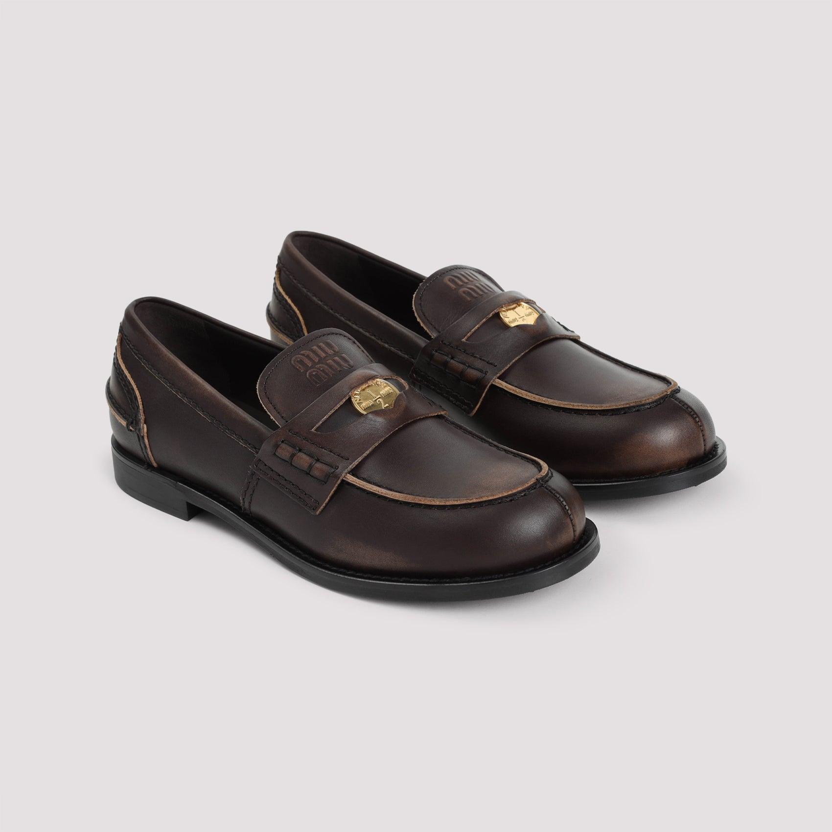 MIU MIU Leather Distressed Penny Loafers In Brown Product Image