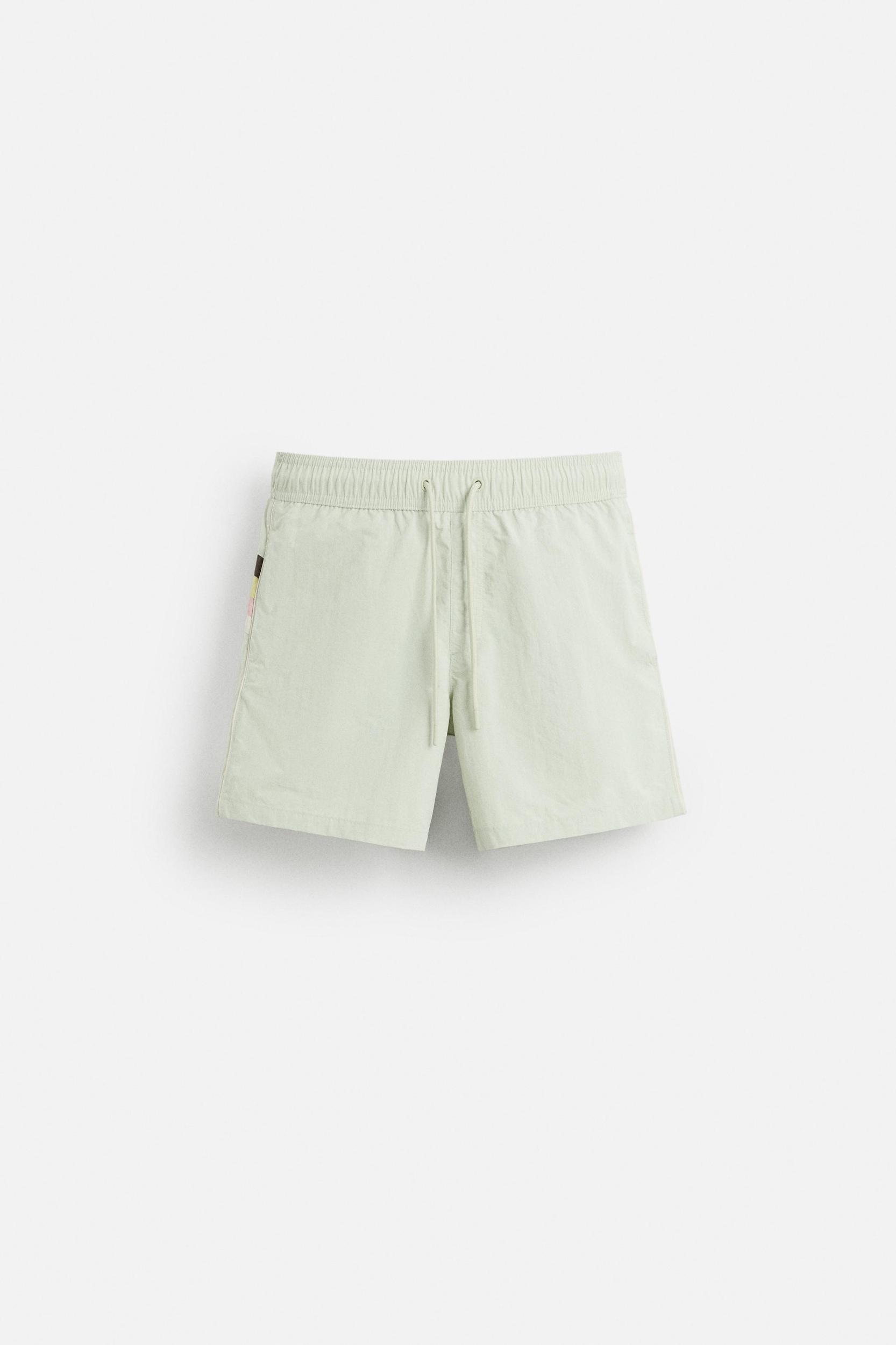 CONTRAST BANDS MID-LENGTH SWIMSUIT Product Image