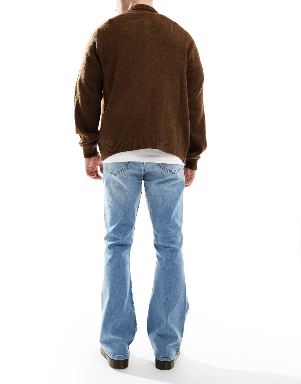 ASOS DESIGN stretch flare jeans in light wash blue Product Image