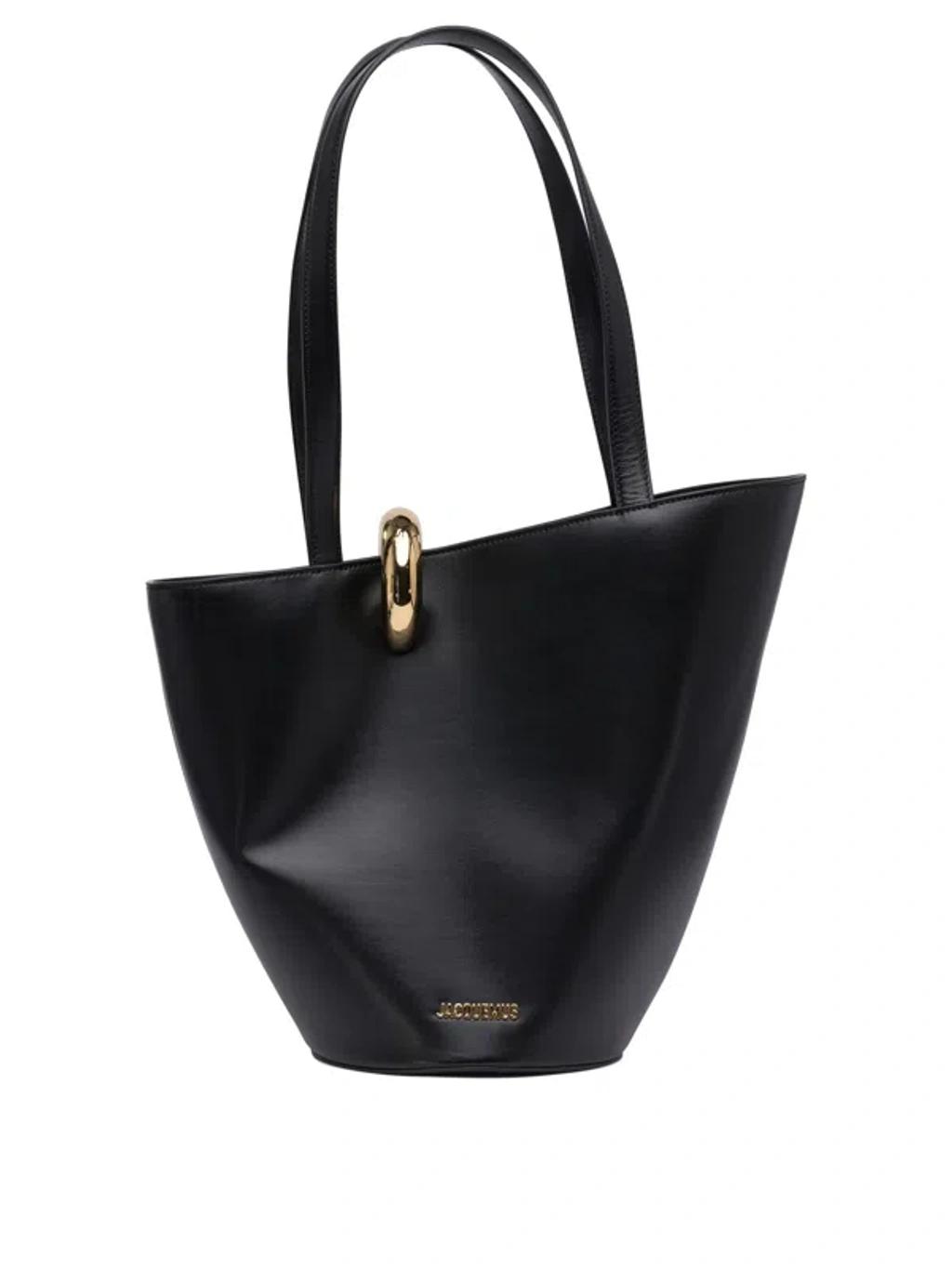JACQUEMUS The Medium Bambola Asymmetric Leather Bucket Bag In Black 990 Product Image
