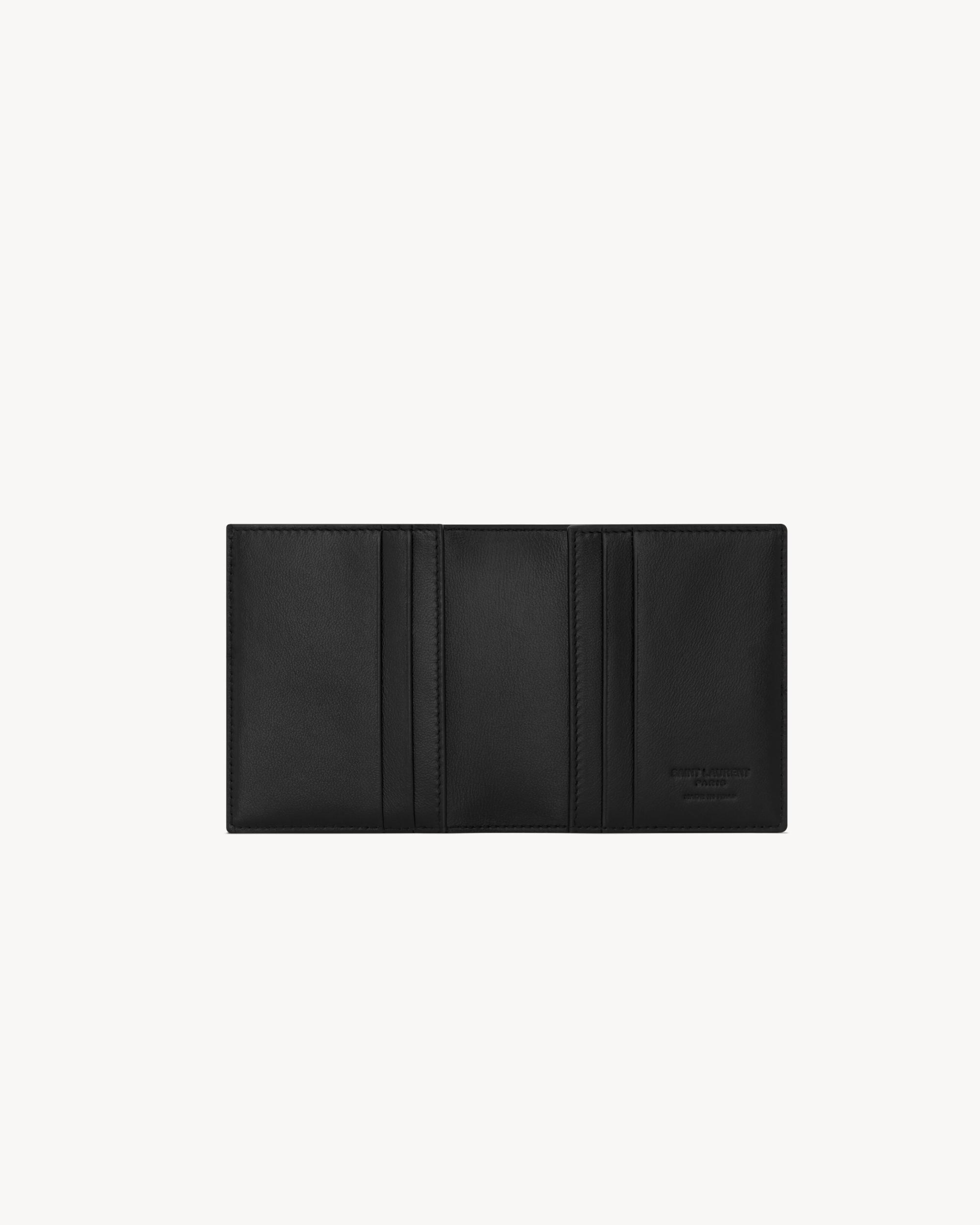 SAINT LAURENT PARIS reversible card case in smooth leather Product Image