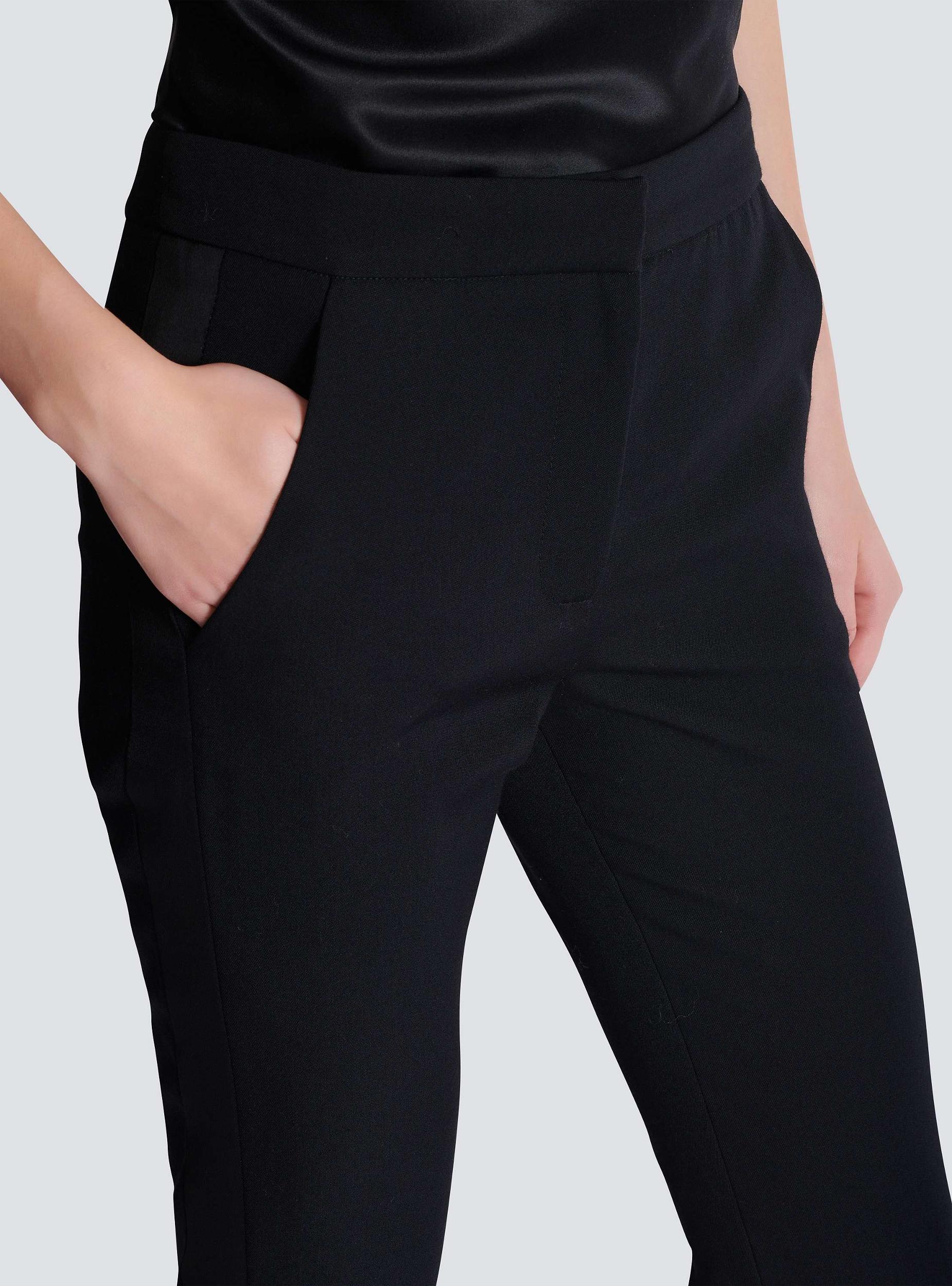 Zipped slim-fit grain de poudre trousers Product Image