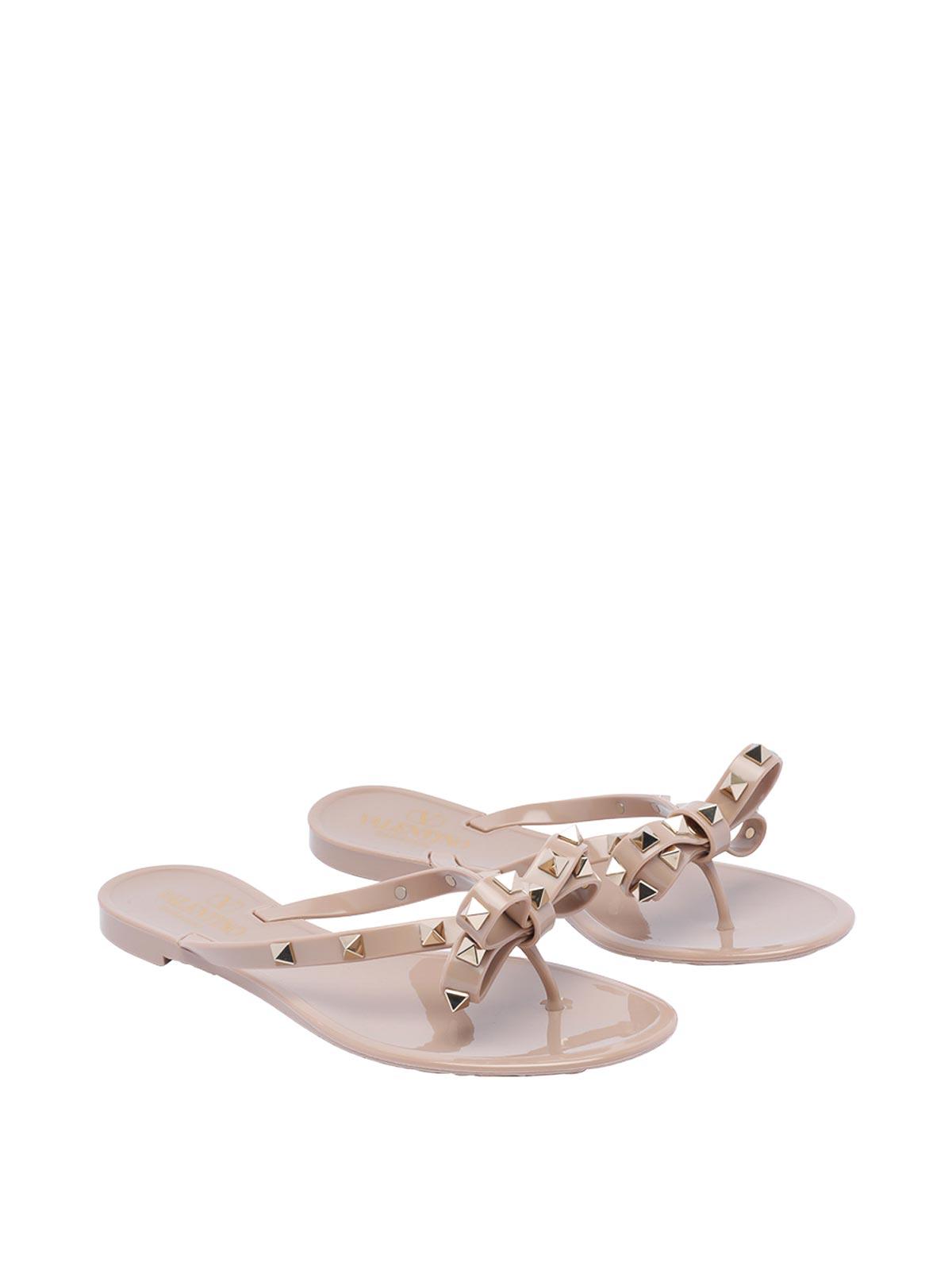 VALENTINO GARAVANI Women Rockstud Rubber Flip Flops In Beige Product Image