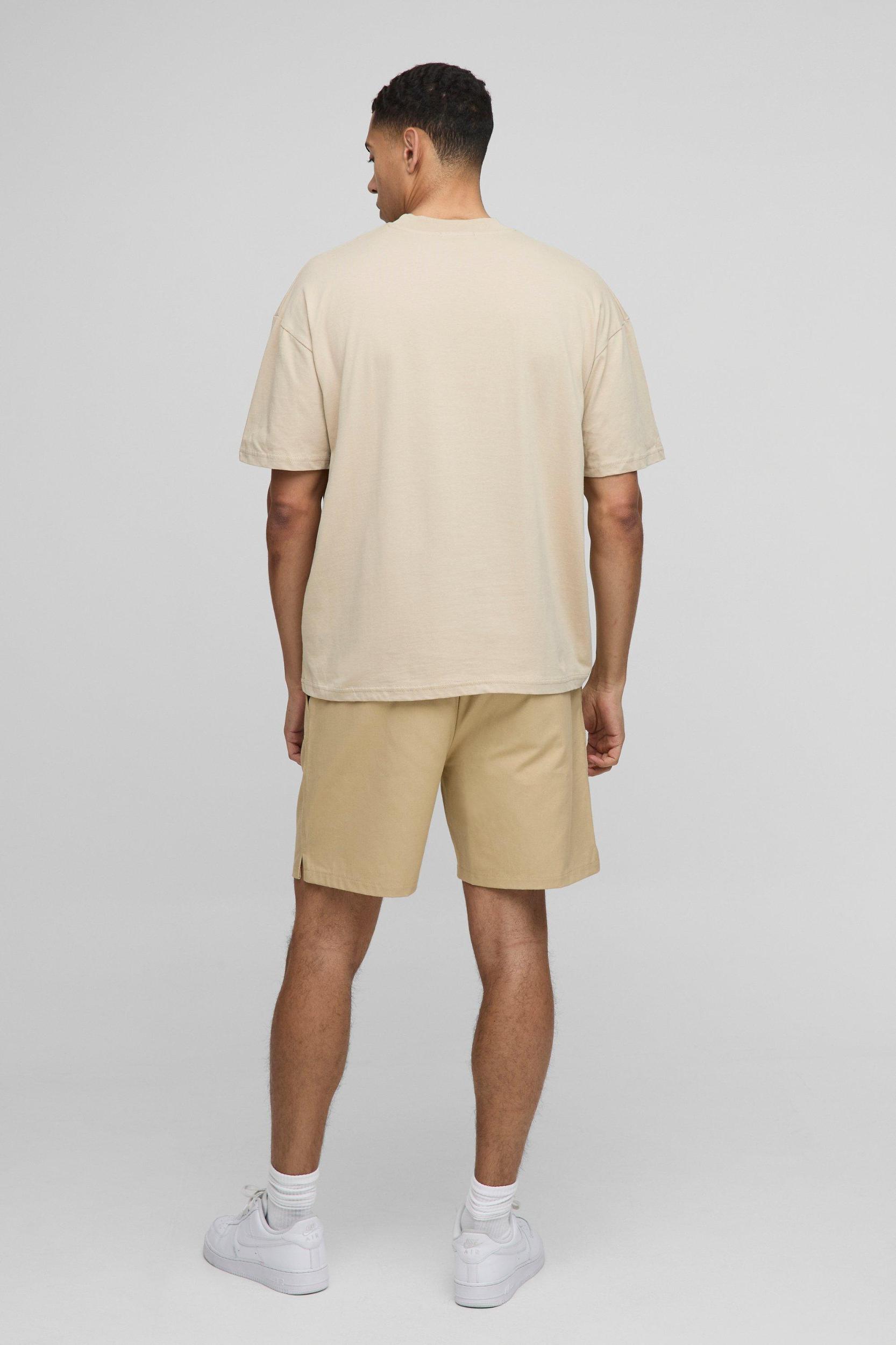 Elasticated Waist Relaxed Woven Tab Canvas Shorts | boohooMAN USA Product Image