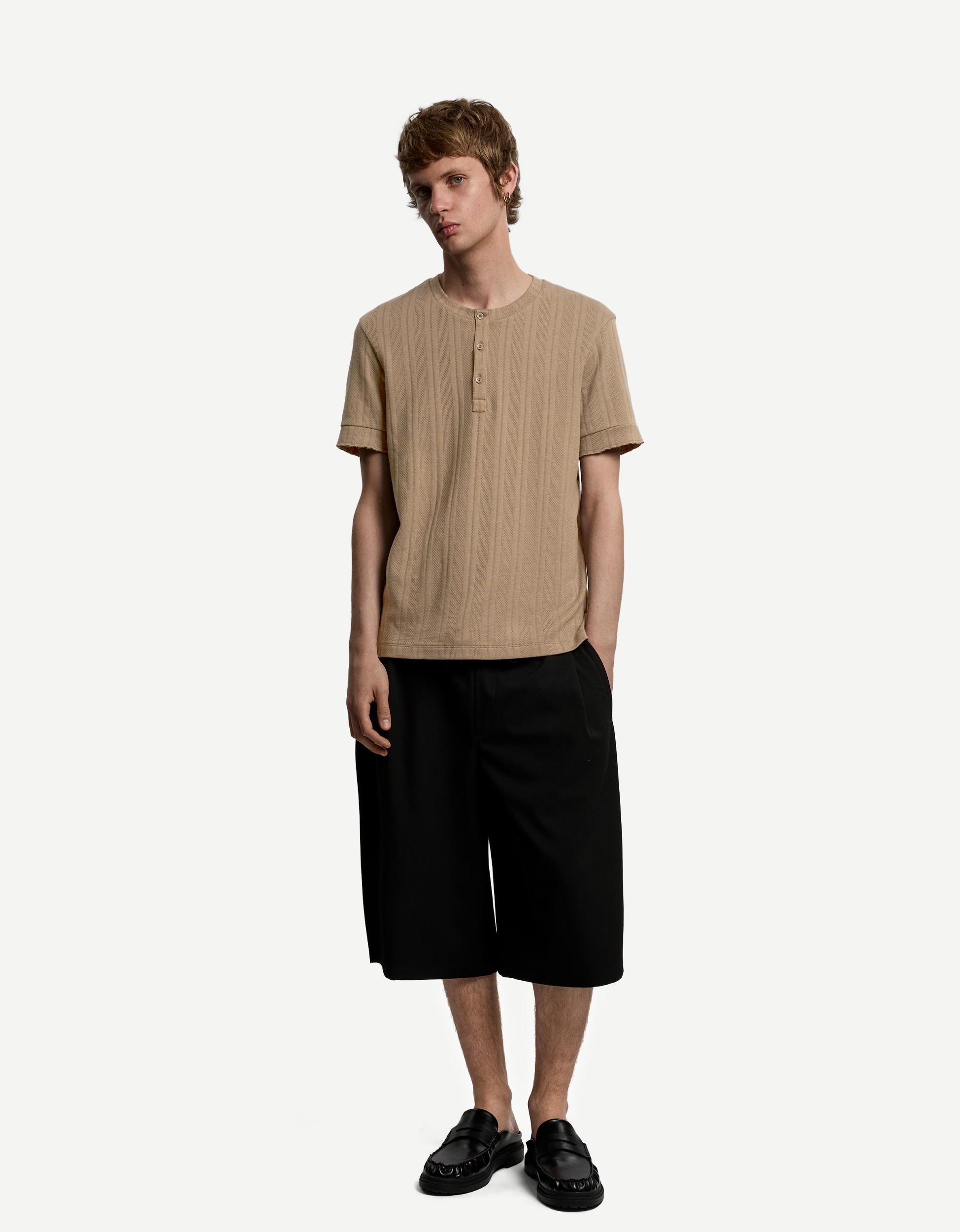 Textured short sleeve T-shirt with buttons Product Image