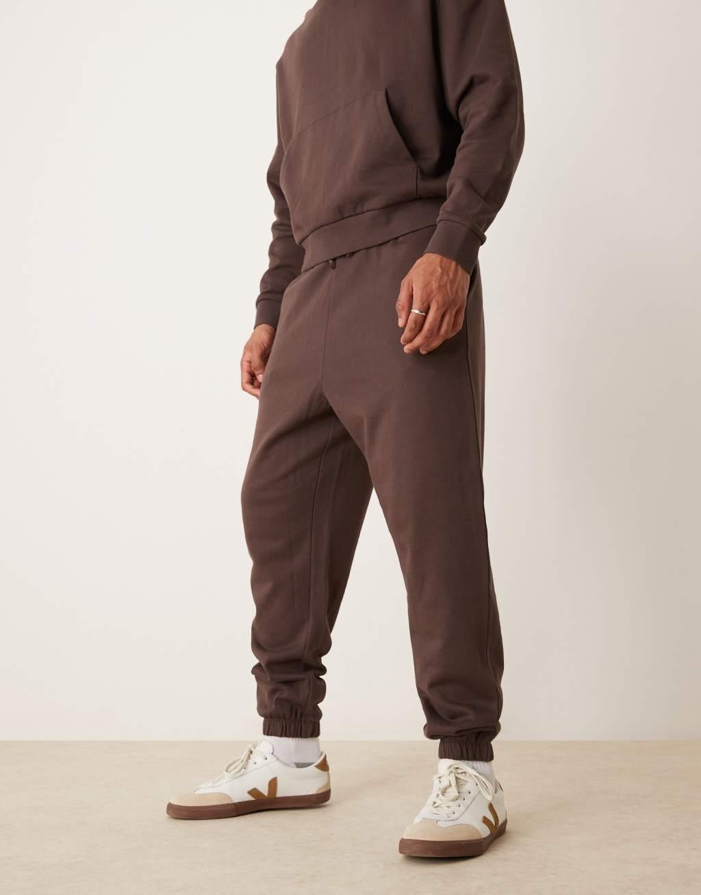 ASOS DESIGN essential oversized sweatpants in brown Product Image