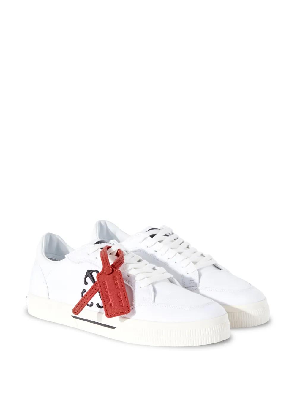 Vulcanized contrasting-tag canvas sneakers Product Image