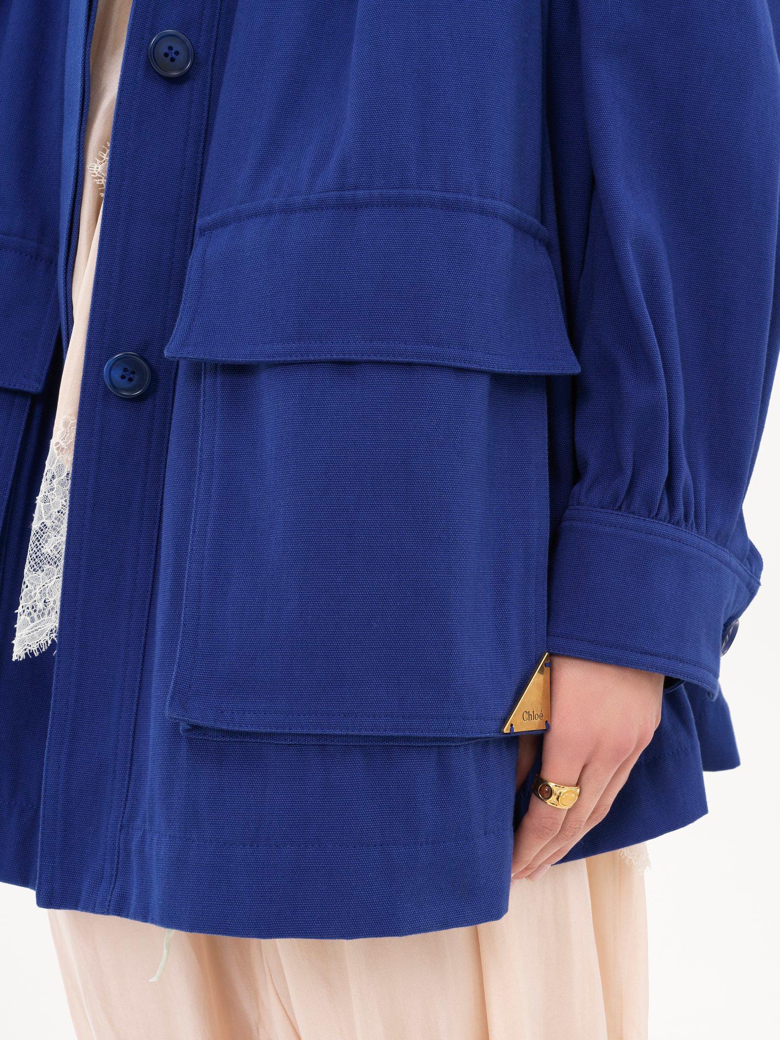 High-neck utilitarian jacket in cotton canvas Product Image