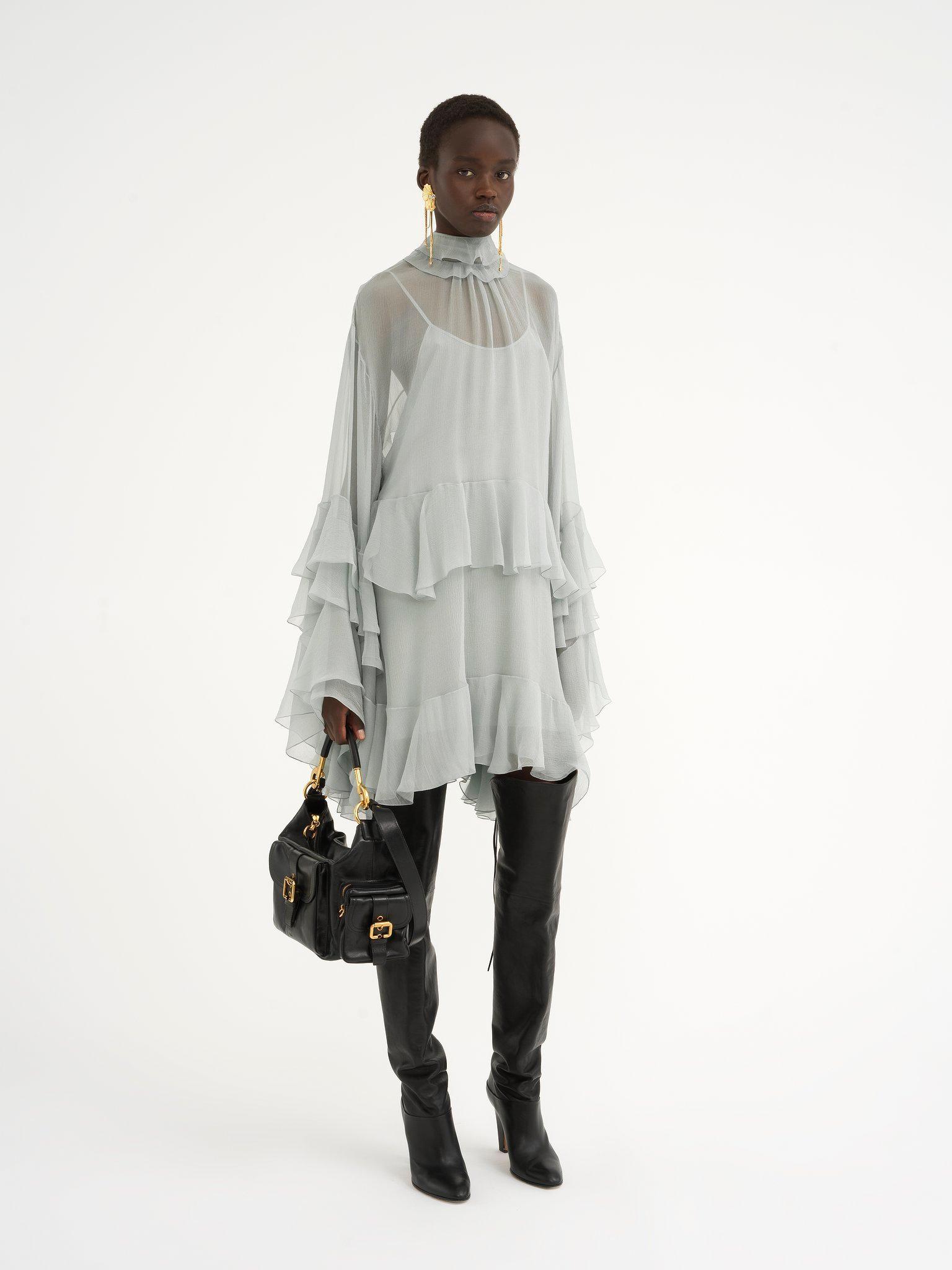 Camera bag in shiny leather Product Image