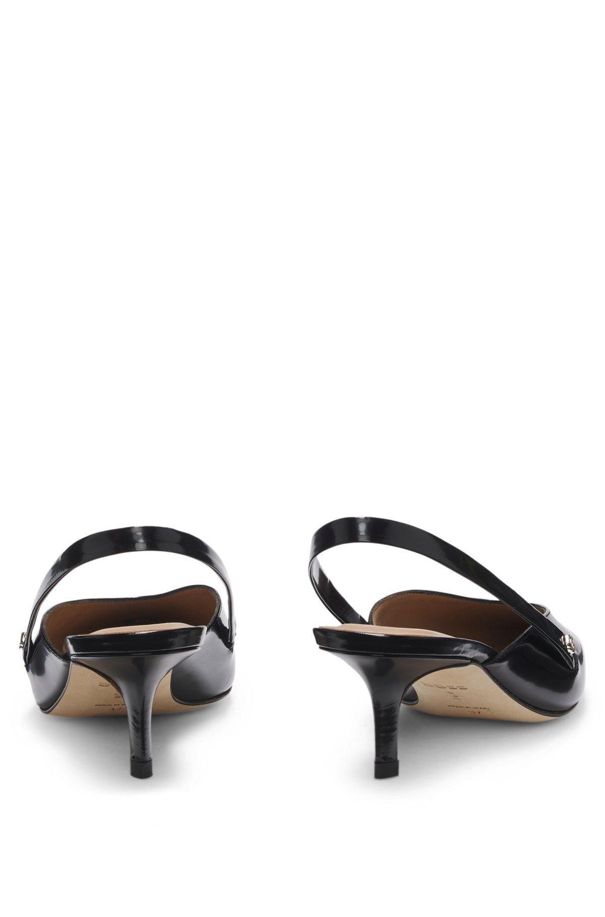 Slingback pumps in polished leather Product Image