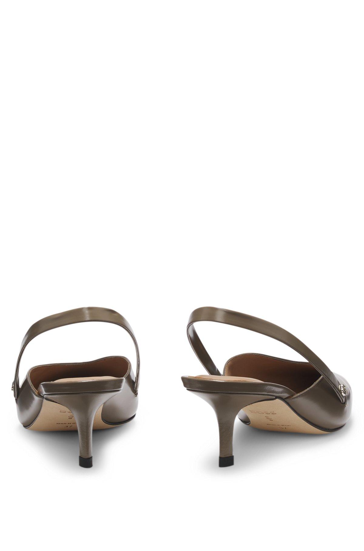 Slingback pumps in polished leather Product Image