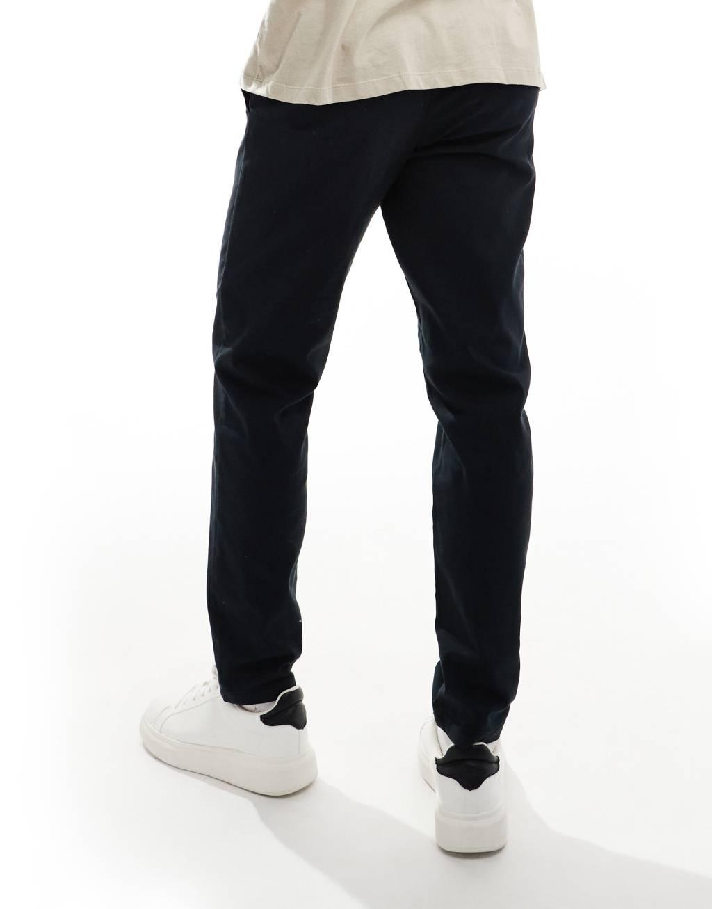ASOS DESIGN tapered chinos in black Product Image
