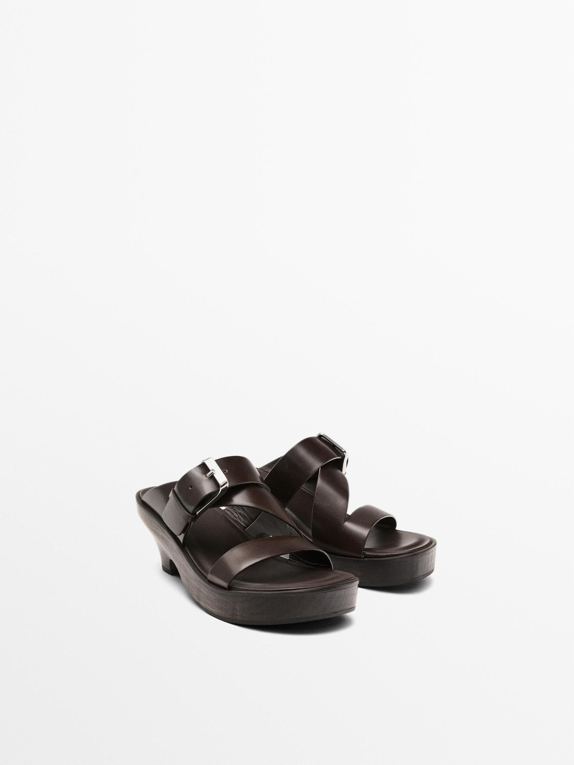 Sandals with wooden heels Product Image