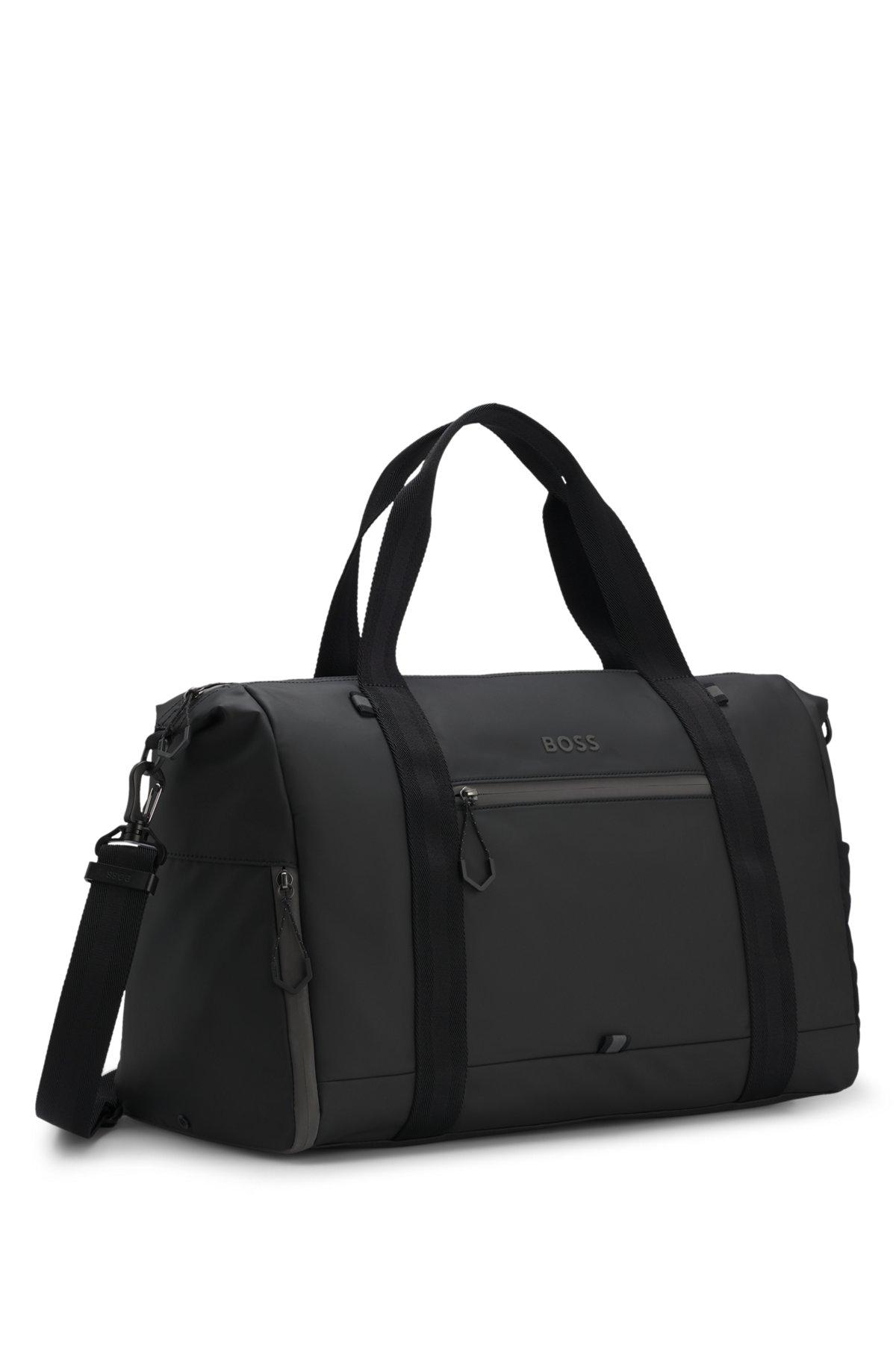 Reflective-detail holdall in faux leather Product Image