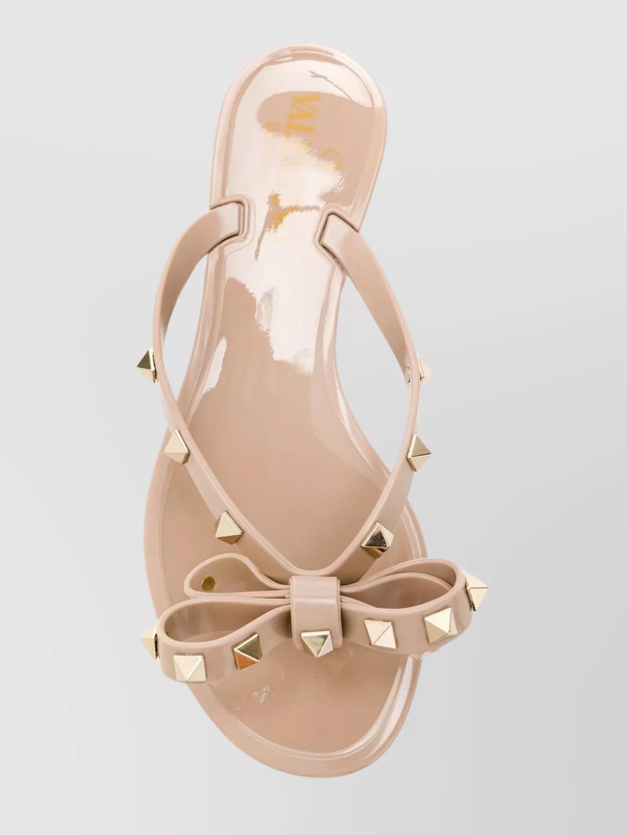VALENTINO GARAVANI Women Rockstud Rubber Flip Flops In Beige Product Image