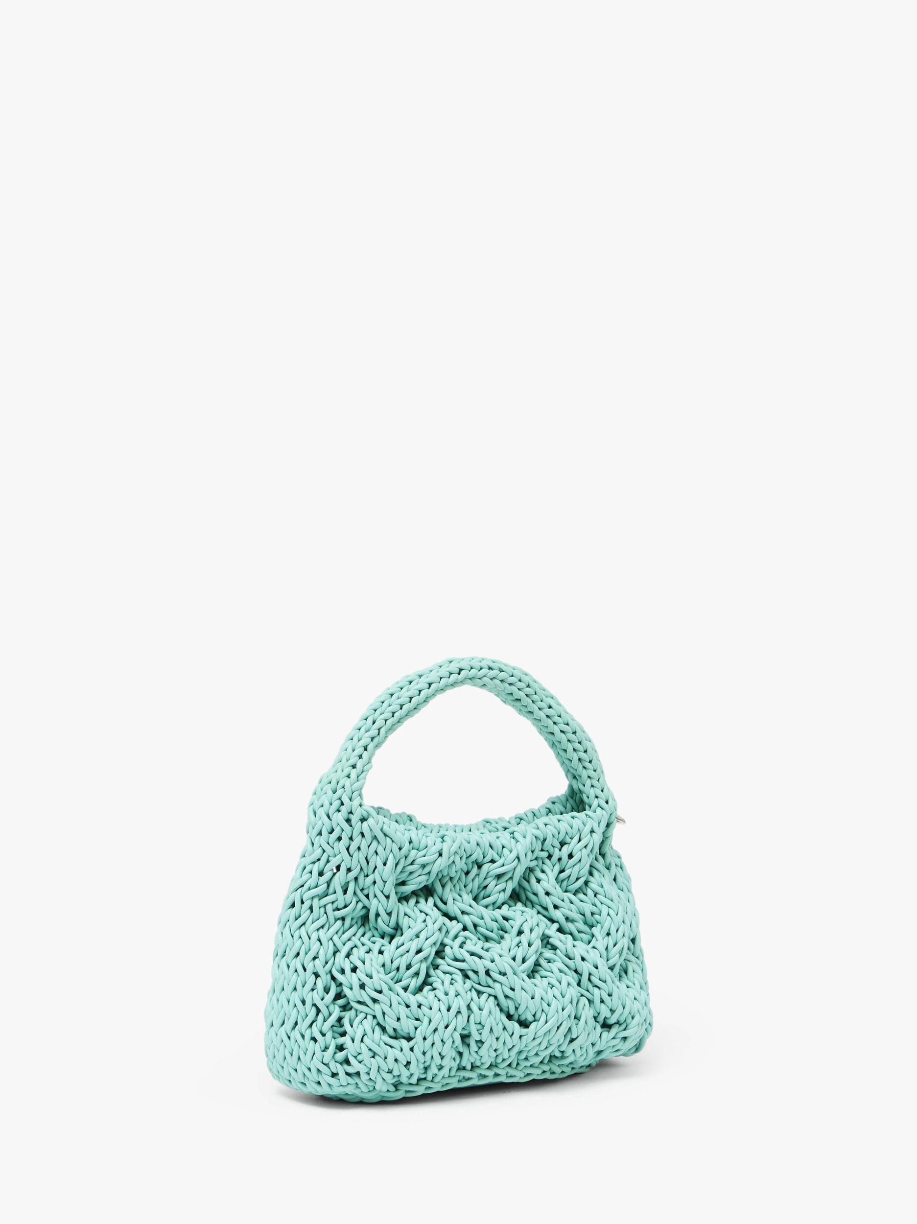 SMALL CABLE KNIT BAG - LEATHER DRAWCORD TOP HANDLE BAG Product Image