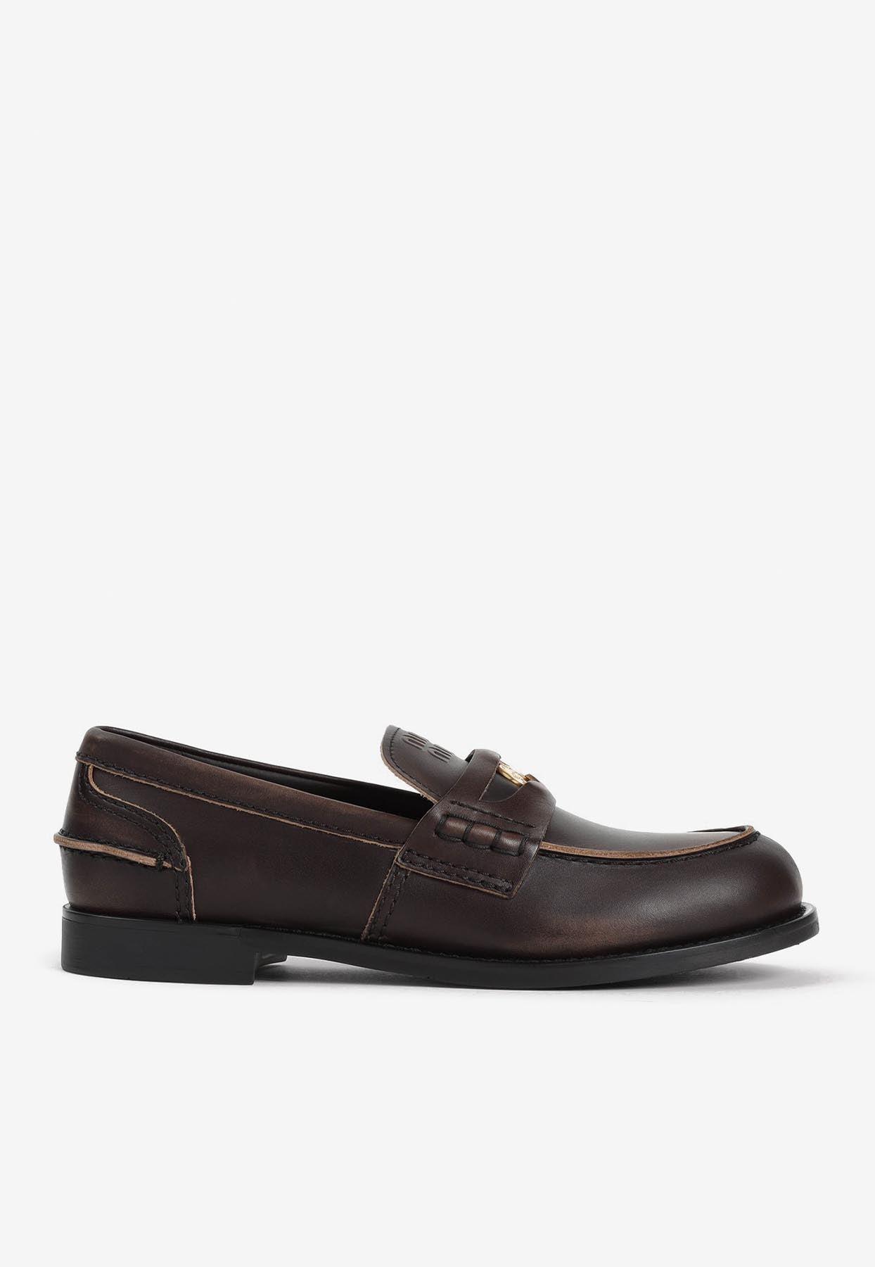 MIU MIU Leather Distressed Penny Loafers In Brown Product Image