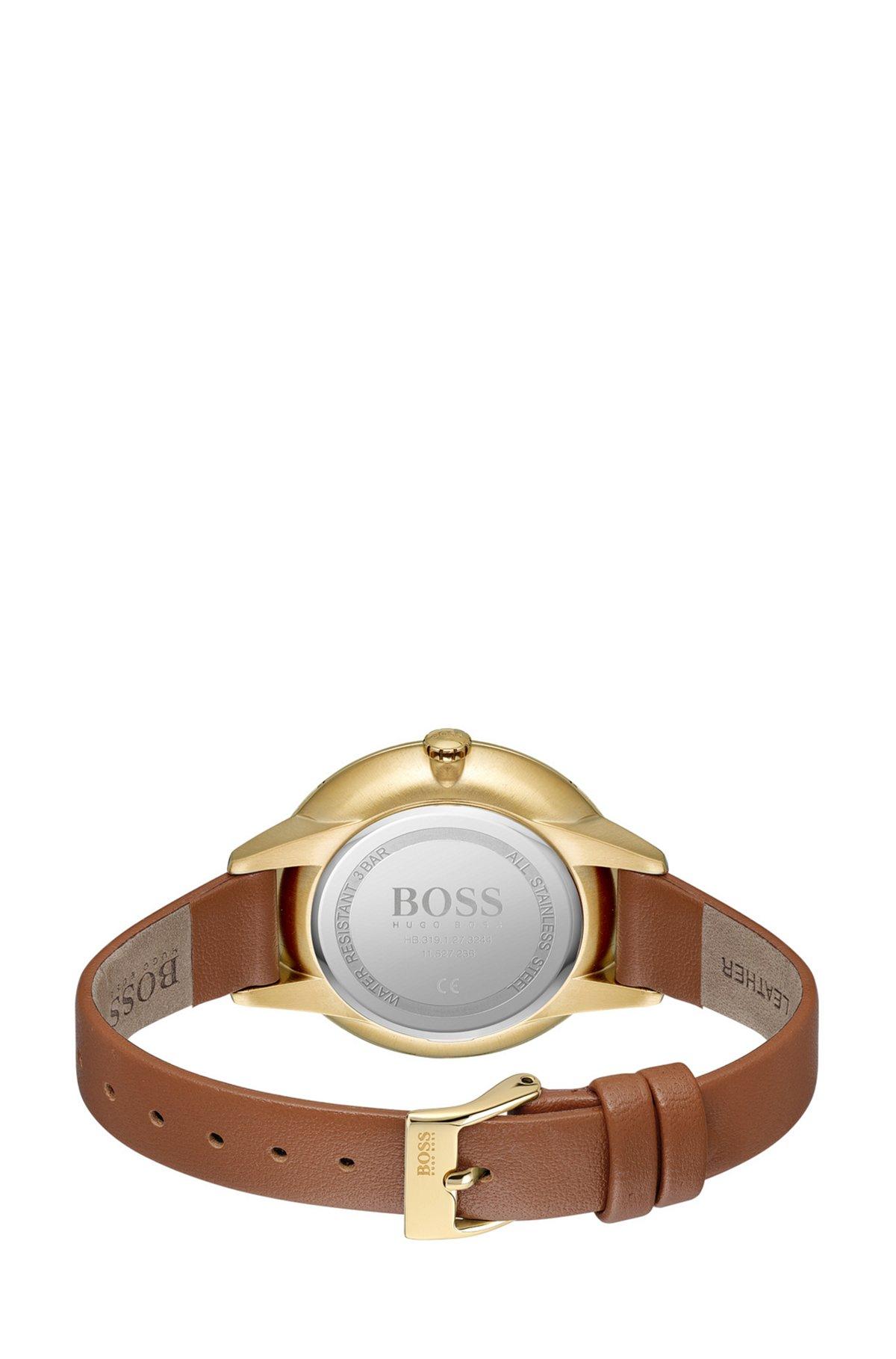 Gold-toned watch with crystal accents and leather strap Product Image