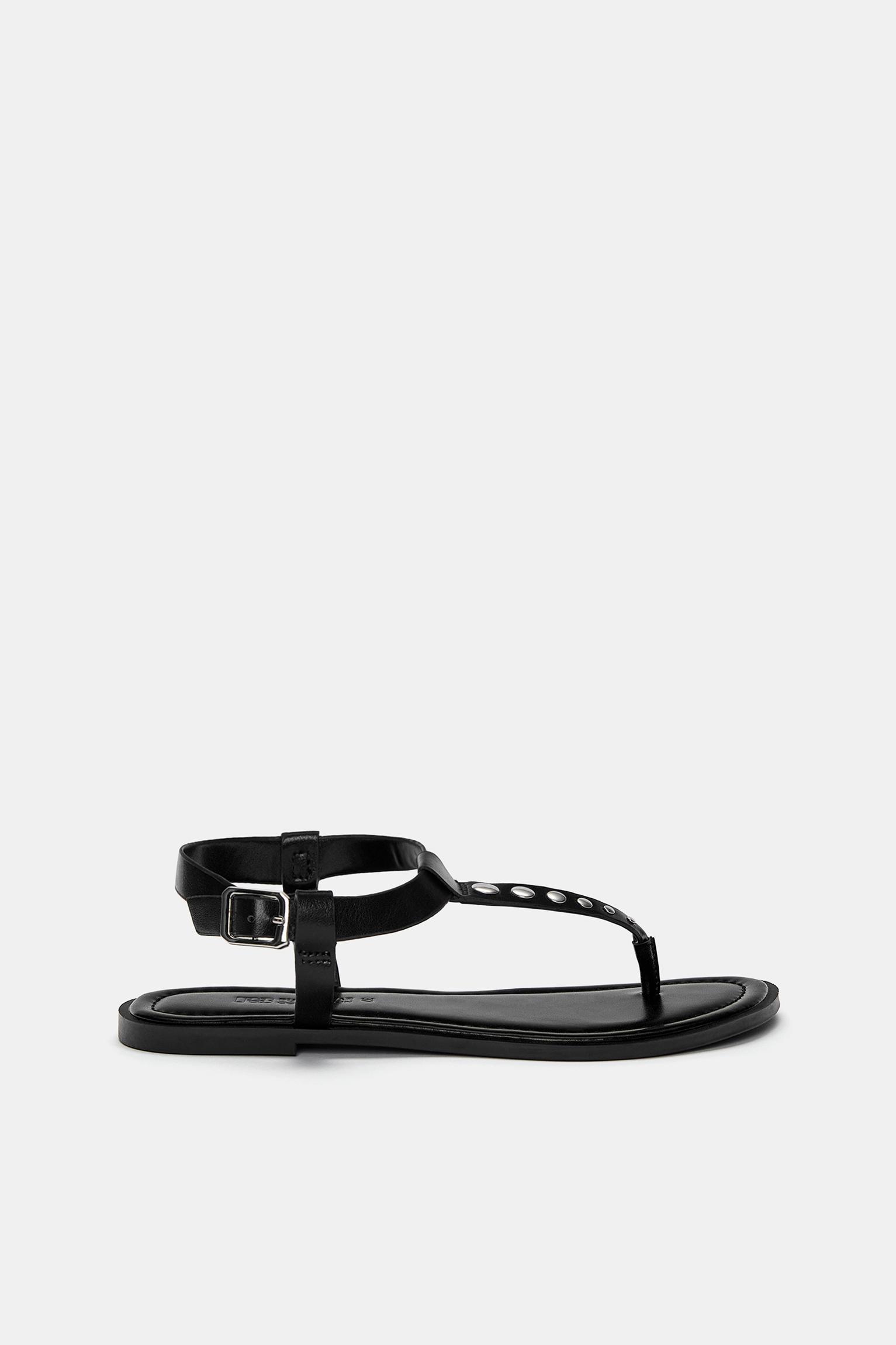 Flat sandals with decorations Product Image