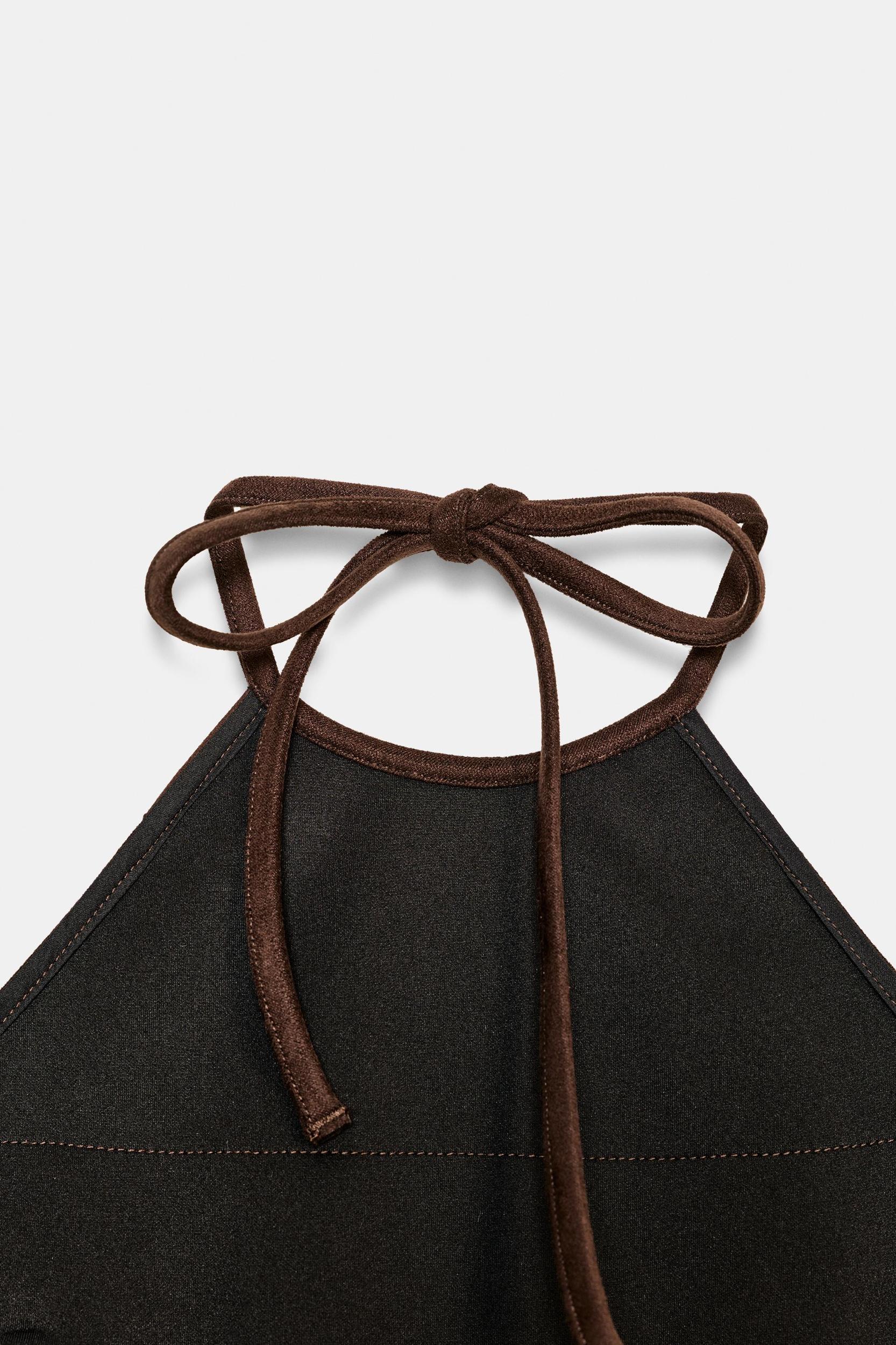 SHIMMER FAUX SUEDE FRINGE TOP Product Image