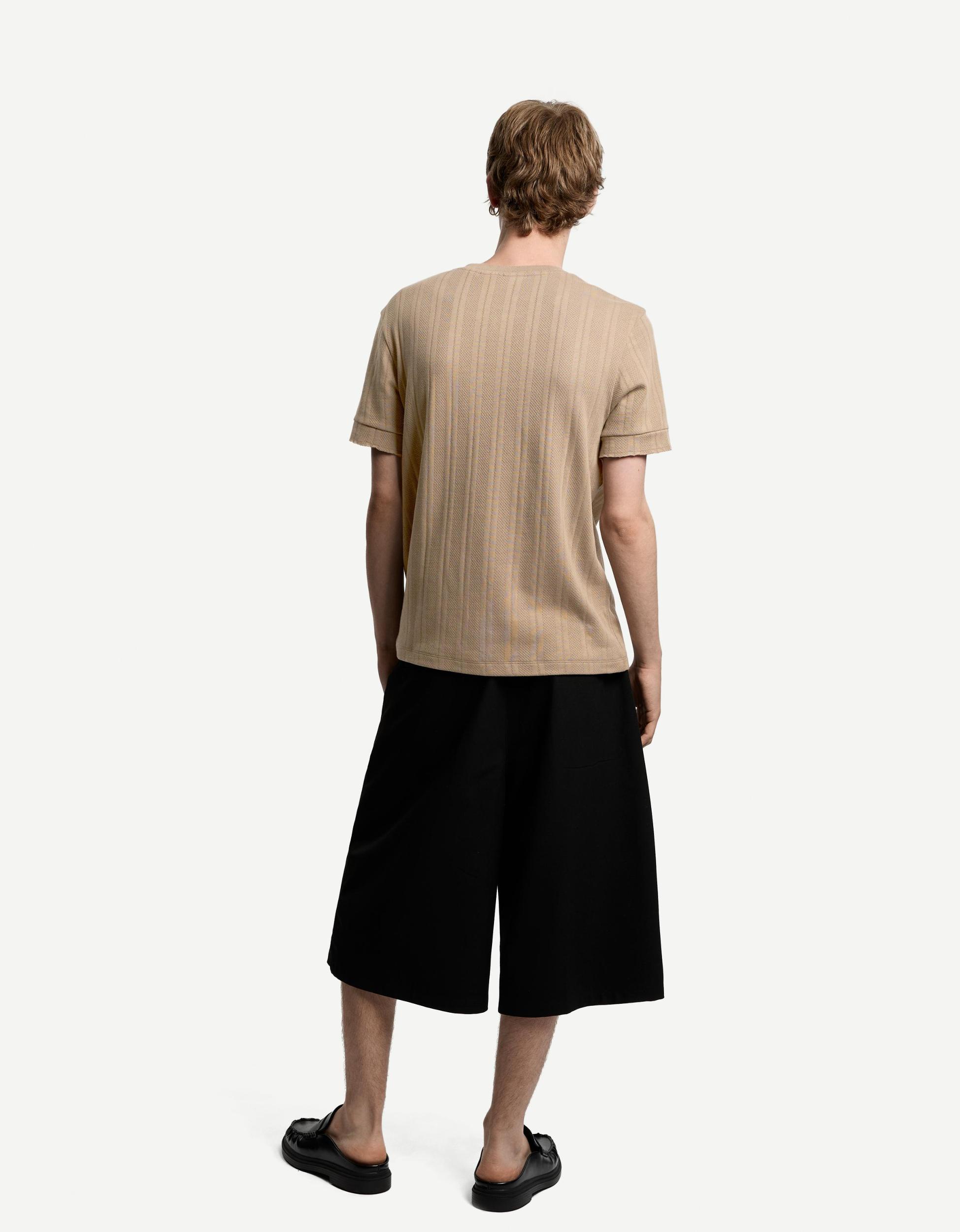 Textured short sleeve T-shirt with buttons Product Image