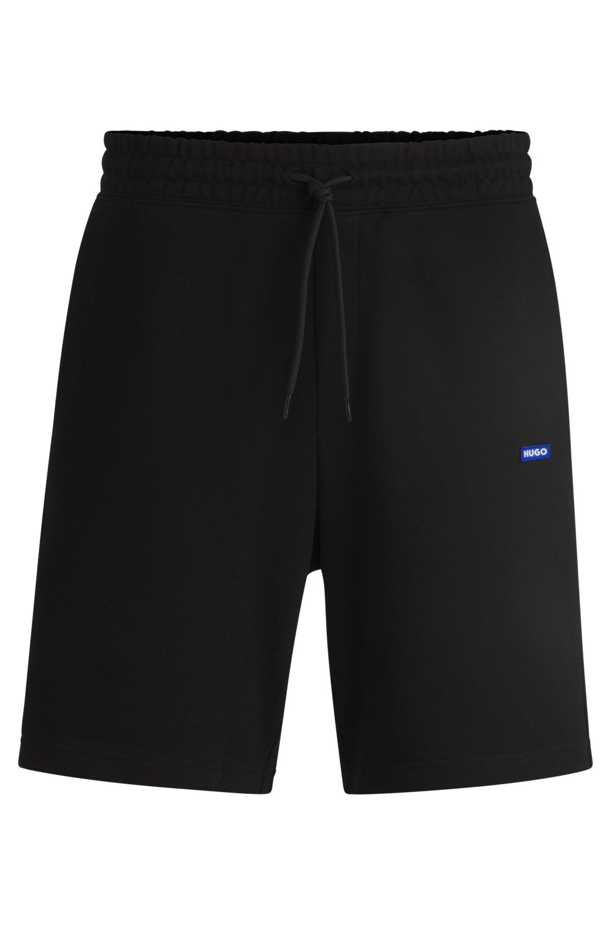 Cotton-terry shorts with blue logo patch Product Image