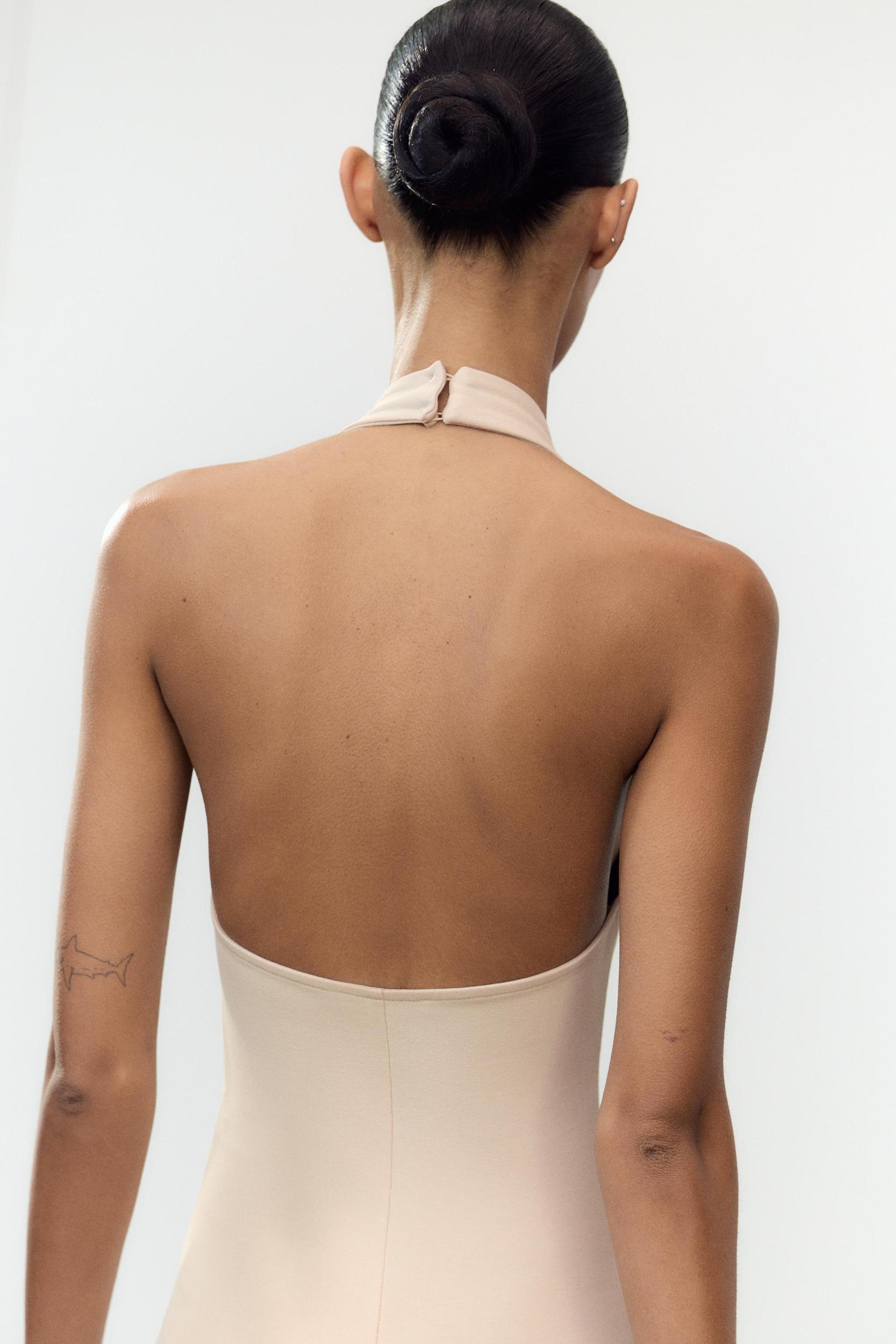 LONG HALTER INTERLOCK JUMPSUIT Product Image