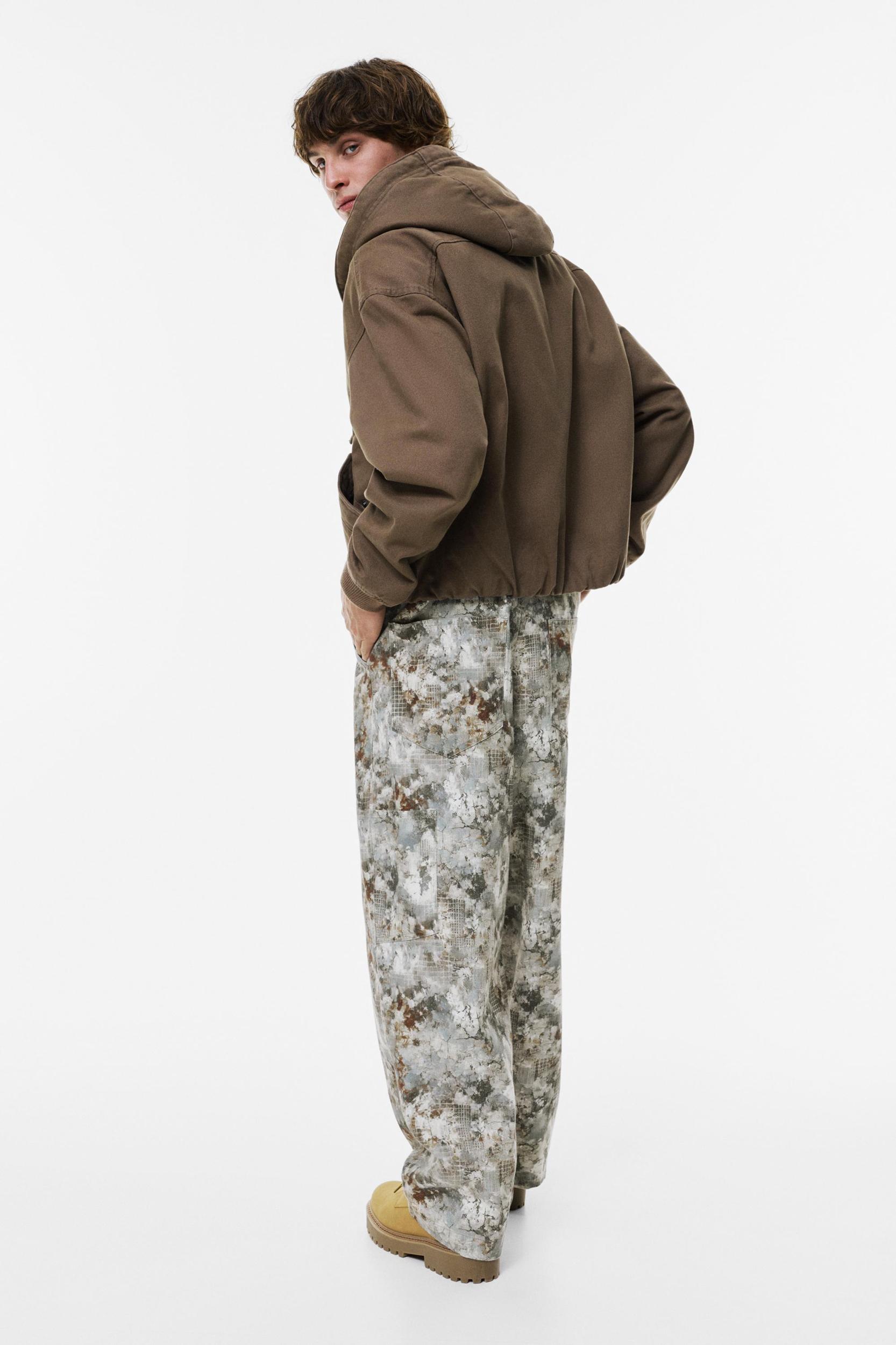 Camouflage print carpenter jeans Product Image
