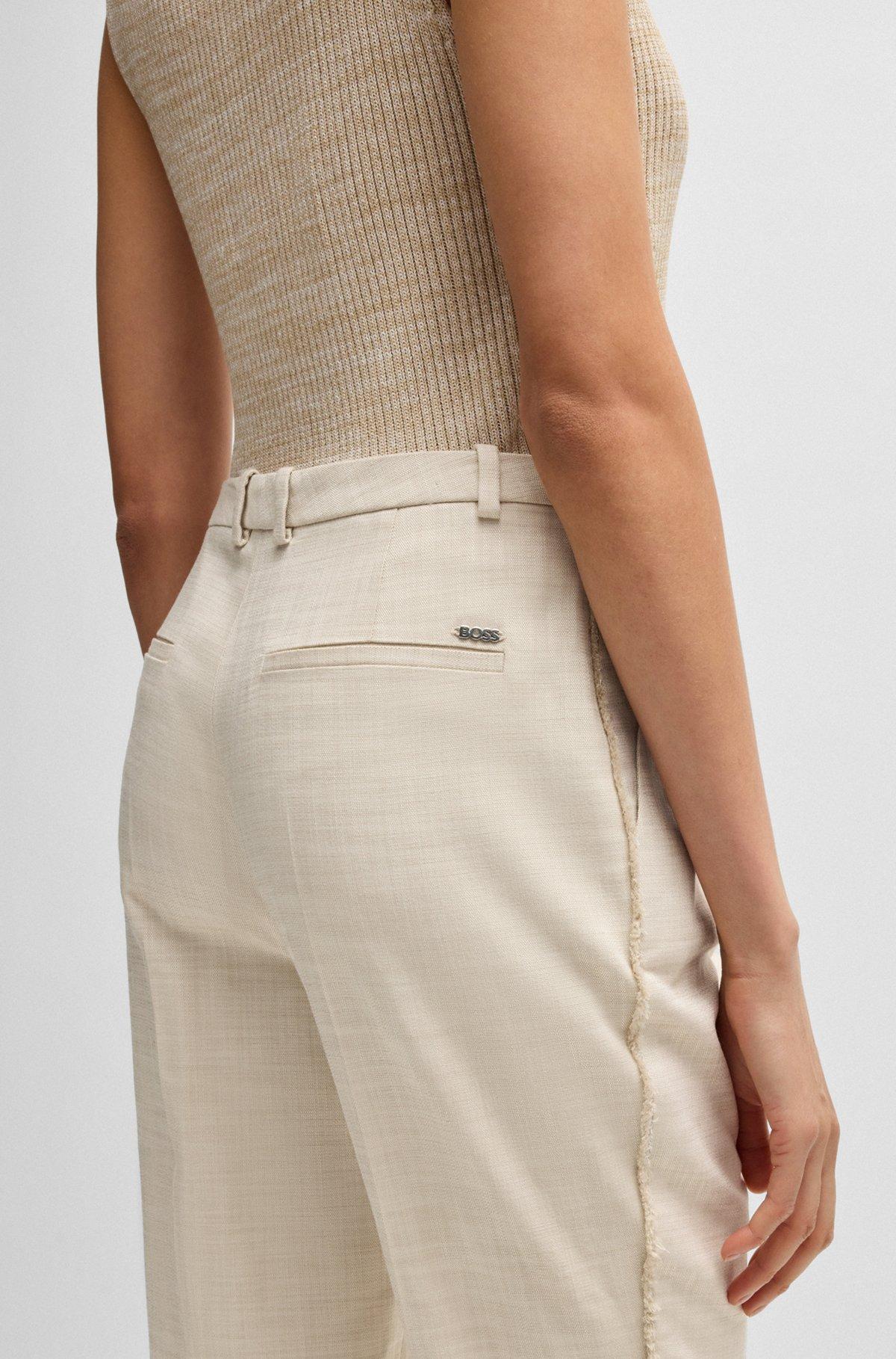 Relaxed-fit trousers in melange stretch fabric Product Image