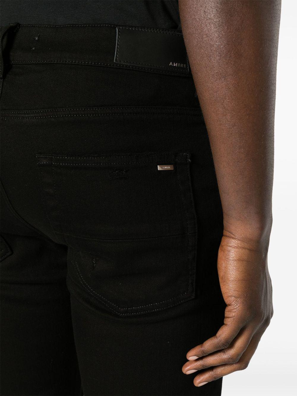 Thrasher leather-trim skinny jeans Product Image