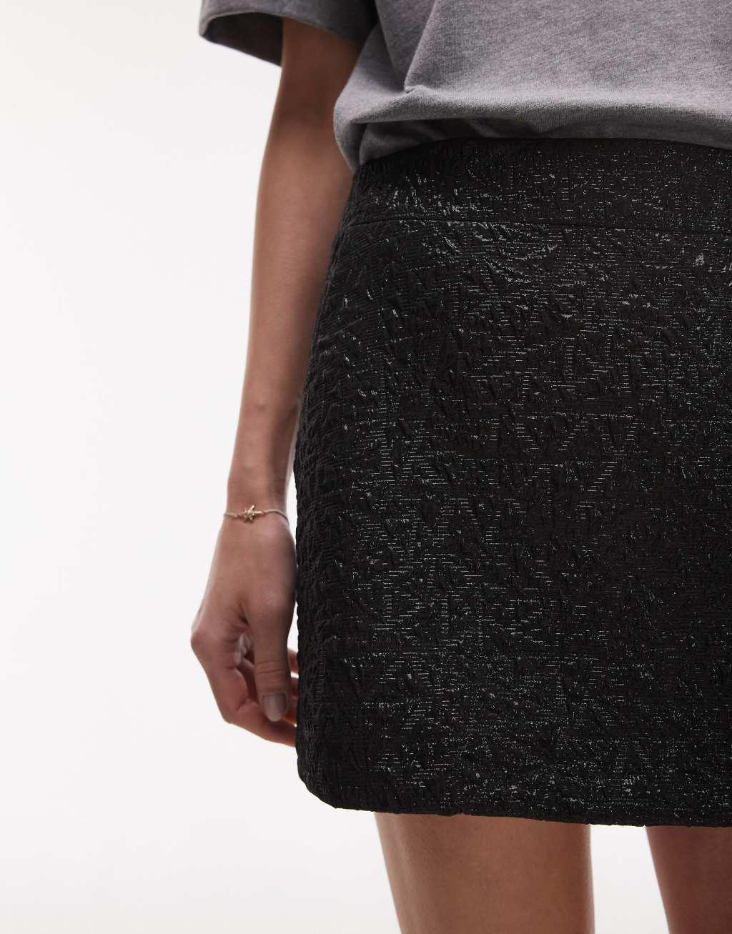 Topshop textured jacquard mini skirt in black Product Image
