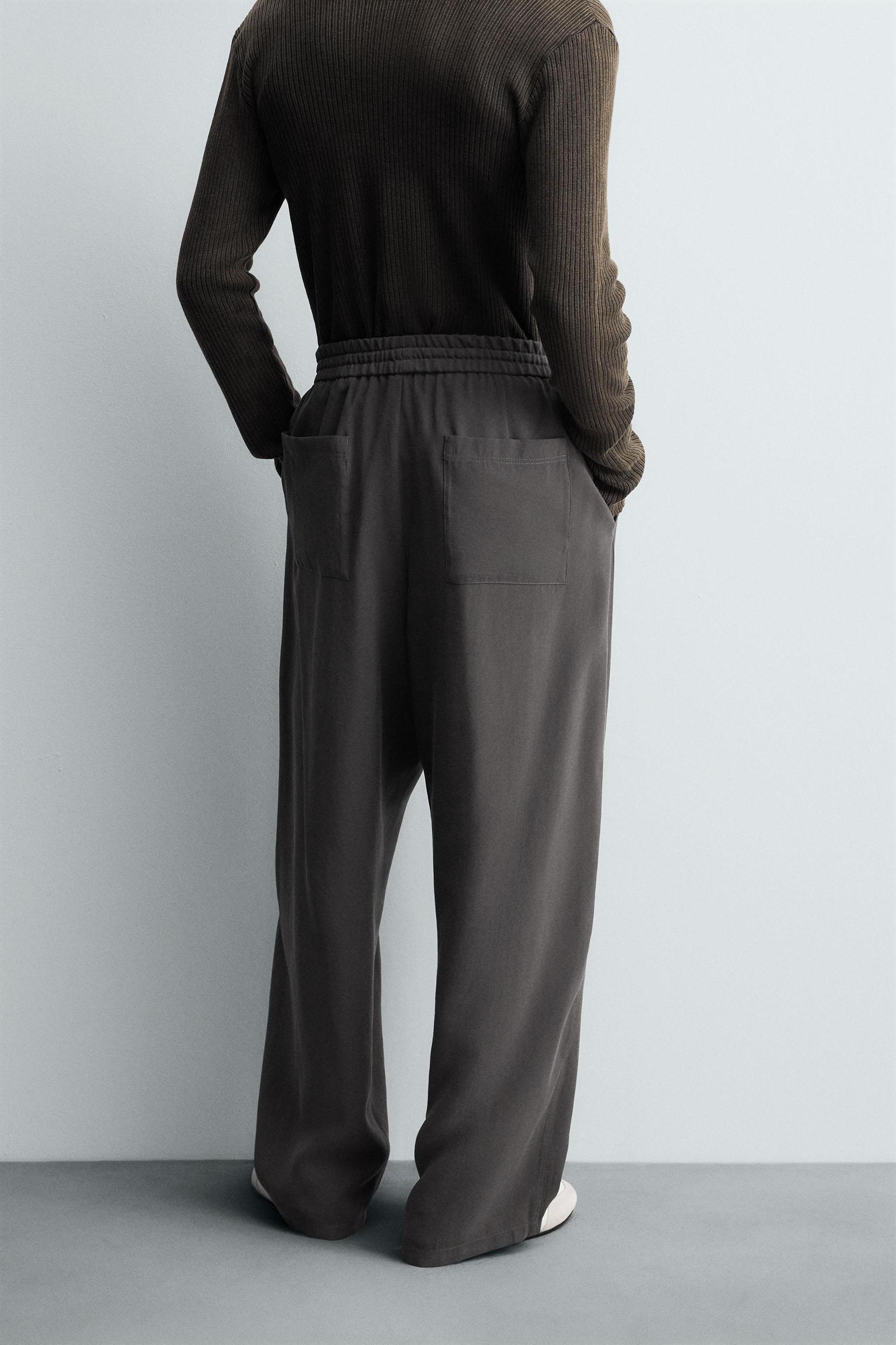 FLOWY TOPSTITCHED PANTS Product Image