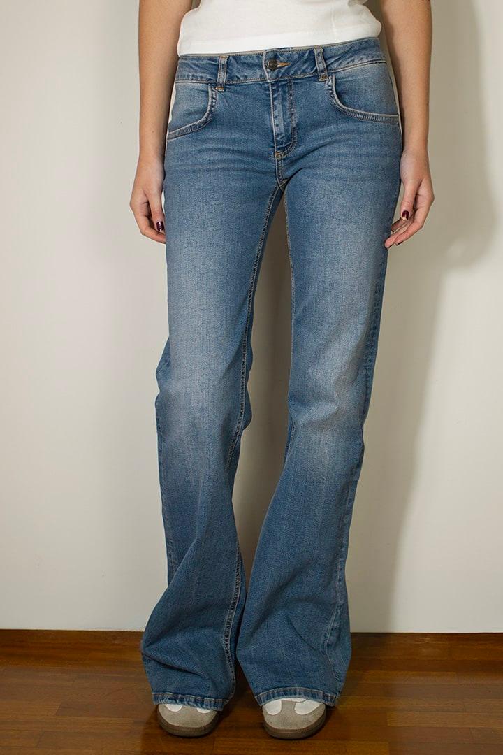 Low waist flared jeans with stars studs Product Image