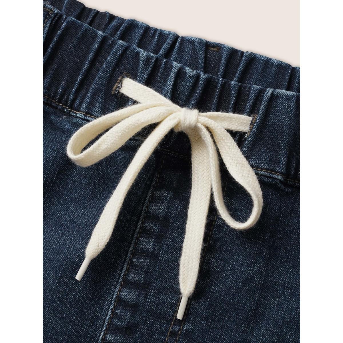 Plus Size Dark Wash Drawstring Roll Hem Denim Shorts Women Denimblue Roll Hem High stretch Everyday Slanted pocket Casual Denim Shorts BloomChic 28/5X Product Image