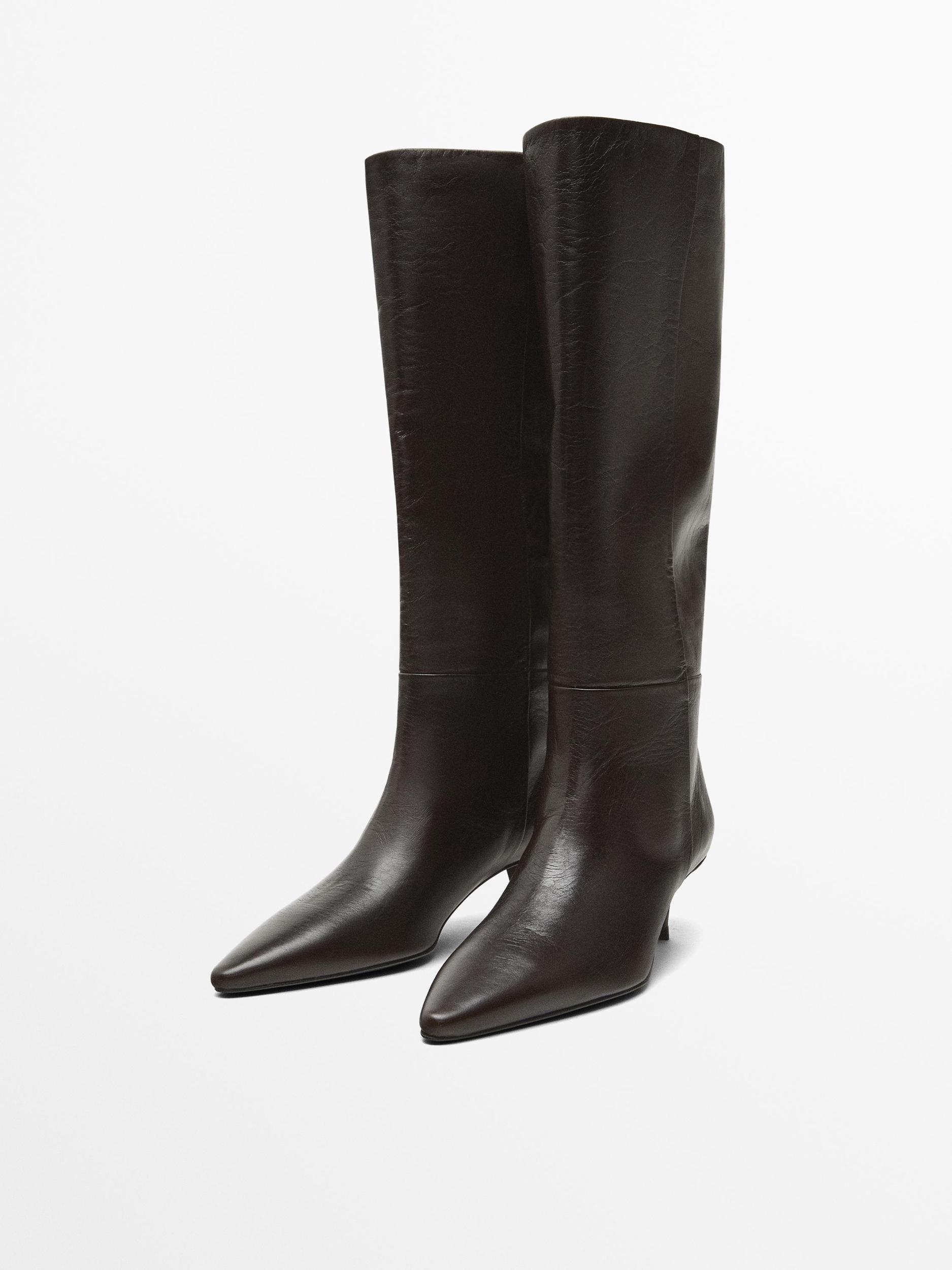 Heeled leather boots Product Image