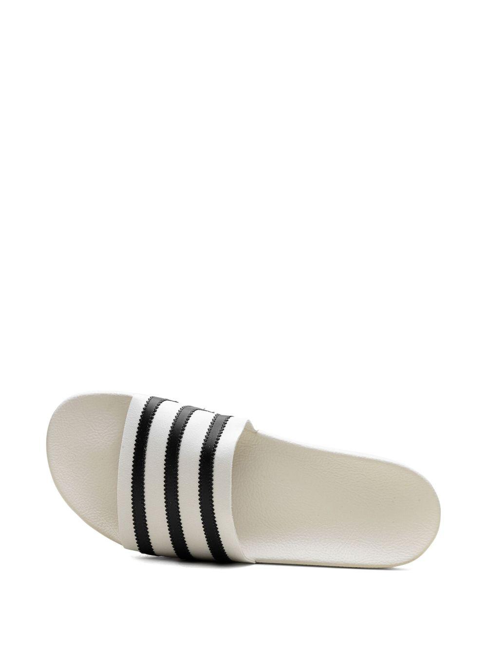 x Fear of God Athletics Adilette "Cream White" slides Product Image